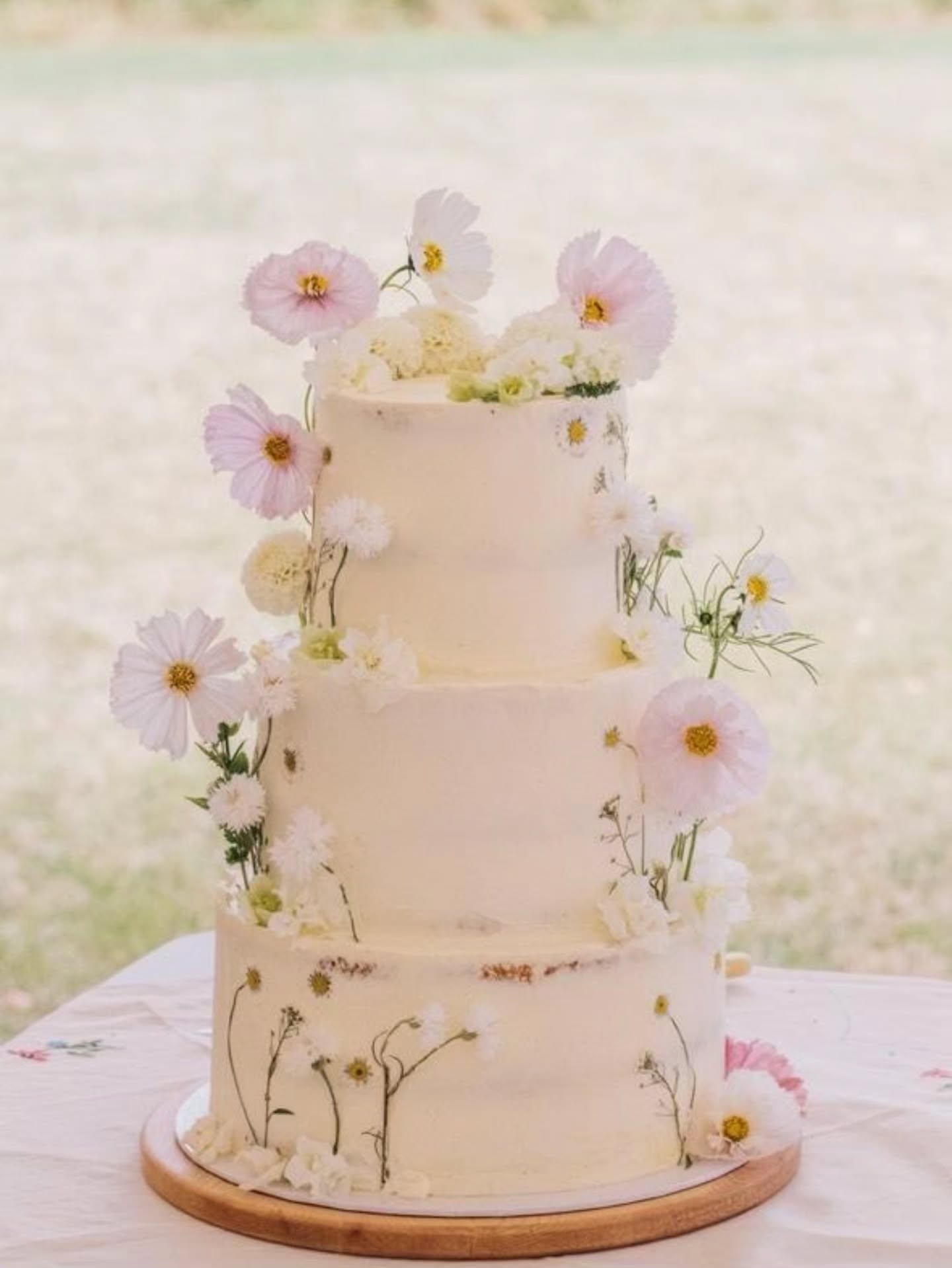 🤍Soft, romantic and beautifully natural🤍
A semi naked wedding cake adorned with both fresh and pressed blooms - the dreamiest mix of texture and tone. The delicate palest pink and white flowers make this cake pure magic.
Created by the ever-talented @boho.cakes who has such a natural gift for this style - effortless, gentle and full of feeling.
Captured to perfection by @deborahgrace_photography who framed the romance of the day with pure artistry.
#bohowedding
#romanticcake
#cakeartist
#edibleflowercake
#edibleflowers
#pressedflowers
#seminakedcake
#weddinginspiration