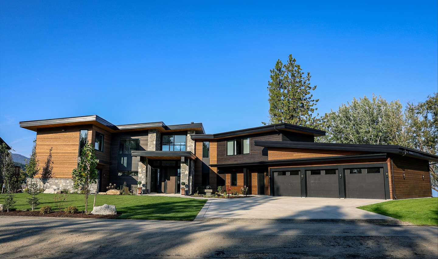 Modern design meets natural warmth ✨🌳
This custom lakeside home is a true showcase of craftsmanship and creativity. From the bold architectural lines to the mix of wood, stone, and metal, every detail was designed to stand out while blending seamlessly with the landscape.
Expansive windows fill the home with natural light and frame stunning lake views, while the outdoor living spaces make it easy to enjoy every season in North Idaho. A perfect balance of contemporary design and timeless comfort.
#CustomHome #ModernDesign #NorthIdahoHomes #LuxuryLiving #RameyConstruction #ModernArchitecture #DreamHome #BuildingInspiration