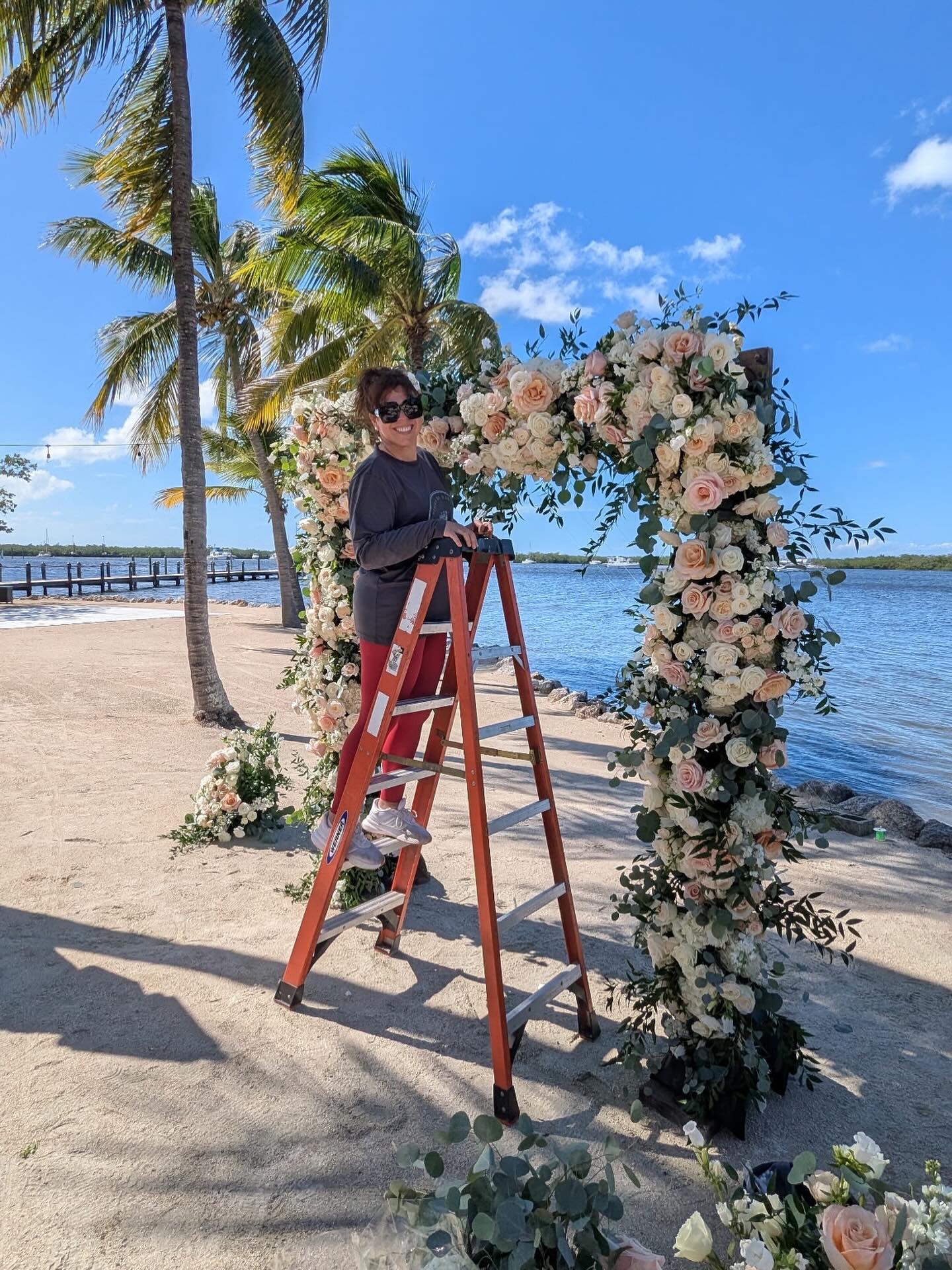 ✨ Blooming by the sea 🌊💐 In my happy place as I bring floral dreams to life in the stunning Florida Keys — creating a beachside arch of white, blush, and champagne roses, hydrangeas, ranunculus, and lush eucalyptus. Every petal and every detail thoughtfully placed by @designsbydarenda 🌴🌺
Because love deserves the most beautiful backdrop. 🤍
#FloridaKeysWedding #BeachWeddingVibes #LuxuryWeddingFlorist #DesignsByDarenda #FloralDesign #WeddingInspo #WeddingArchGoals #BlushAndWhiteWedding #FloralInstallation #DestinationWedding #KeysBride #TropicalElegance #FlowerMagic #WeddingDecor #BridalInspiration #EventDesign #LuxuryFlorals #CoastalWedding #FloralArtistry #RomanticWedding 🌸🌿✨