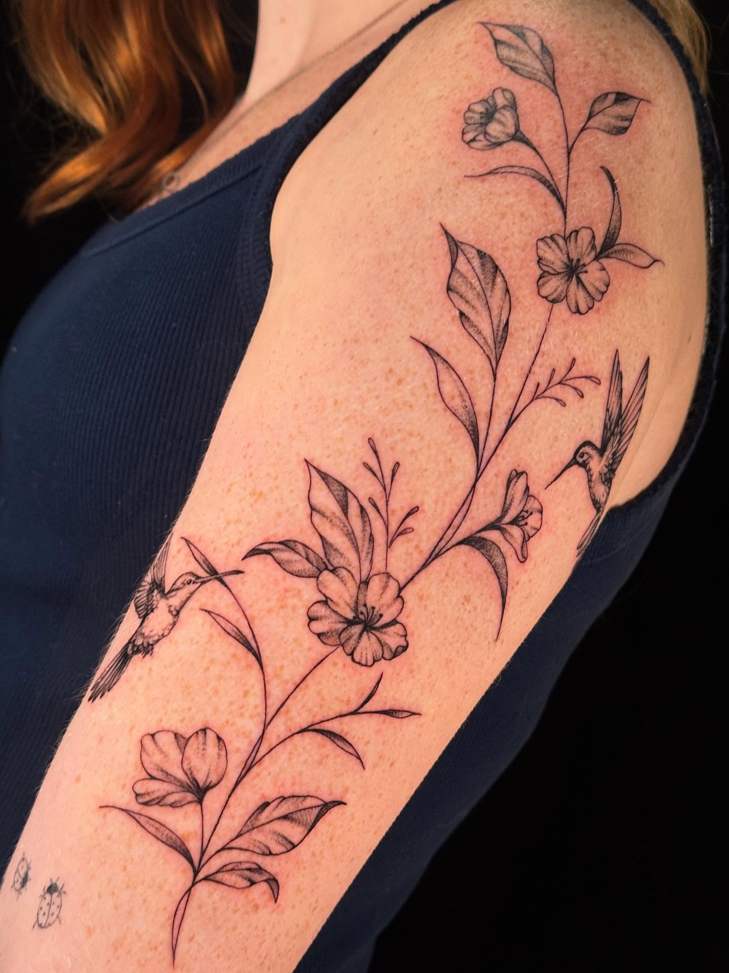 Feminine fine lines for @laurenn.hh ☺️
Done in July 2025
Learning Moment #7: I’ve said this many times but as a tattoo apprentice, linework was my BIGGEST OP 😤 After I pulled my very first line on fake skin, I had a moment of doubt and thought to myself “there’s no way I can do this, maybe I should stick to accounting” 😭 I was a realism artist on paper, so pulling straight lines was definitely not my strong suit. But after months of practice and direction from my mentor, it slowly started to click. My biggest issue was 1) not stretching the skin enough and 2) not going deep enough to hit the dermis. I was so afraid of blowouts that it took quite a bit of time for me to sink my needle deep enough in the skin to feel the vibration change in my machine. And once I felt the difference and learned how to hold a proper stretch, everything made sense. 
For something that felt so impossible at first, I know that consistent practice is what helped me improve every day. I went from 0% single pass lines to 90% since pass lines over the course of 100 tattoos. I just kept envisioning a future version of myself that could pull clean lines without struggling, and that motivated me to keep trying. And even now, I constantly remember the best advice my mentor told me: “pull each line as if it was the entire tattoo. Every single line matters. Take your time and do it right.” 
I’m glad I never gave up, but I know I still have plenty to learn and improve upon. Even though my goal is to specialize in black and grey realism, I’m thankful for all the illustrative and lettering projects that come my way because it helps me stay on top of my progress. Maybe one day I’ll be cool enough to hit 100% single pass lines, but that remains to be seen 😂 I’ll keep working hard and practicing, one line at a time :) 
TLDR: practice makes progress 
#tattoo #tattooartist #arizonatattoo #arizonatattooartist #femaletattooartist #ink #inktherapy #tattooideas #tattoolinework #finelinetattoo