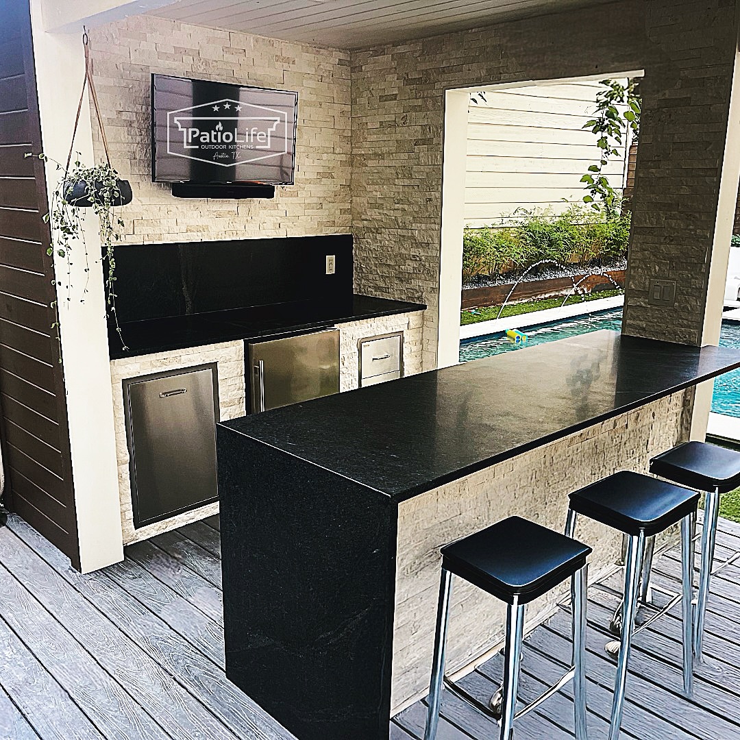 The PatioLife done right! Sleek design, functional layout, quality construction, and a view worth staying for. 😎 🍹☀️
This project features granite countertops with a waterfall end, built-in appliances, bar seating, and MSI - Mayra White stacked stone.
#PatioLife
#outdoorbar
#outdoorkitchen
#patiogoals
#DesignedwithMSI
