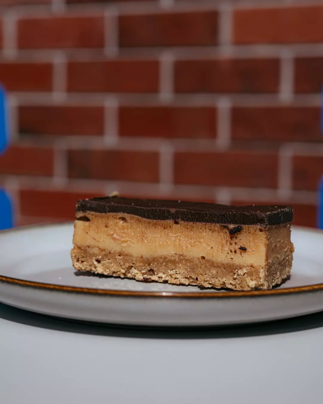 A cabinet favourite — our Flourless Caramel Slice.
Pop by and see what else is fresh in the cabinet.