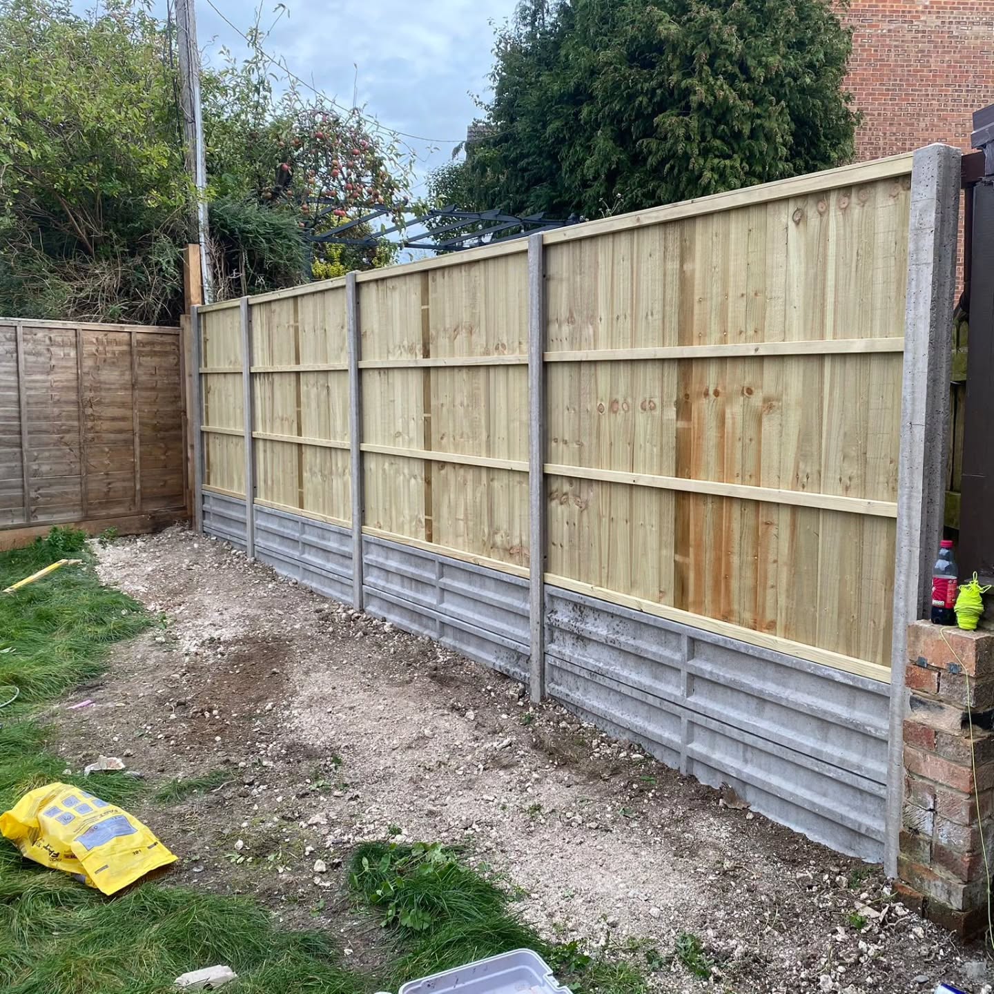 Great job completed today by the boys. ð Height differences between gardens can be tricky. One happy customer. ð