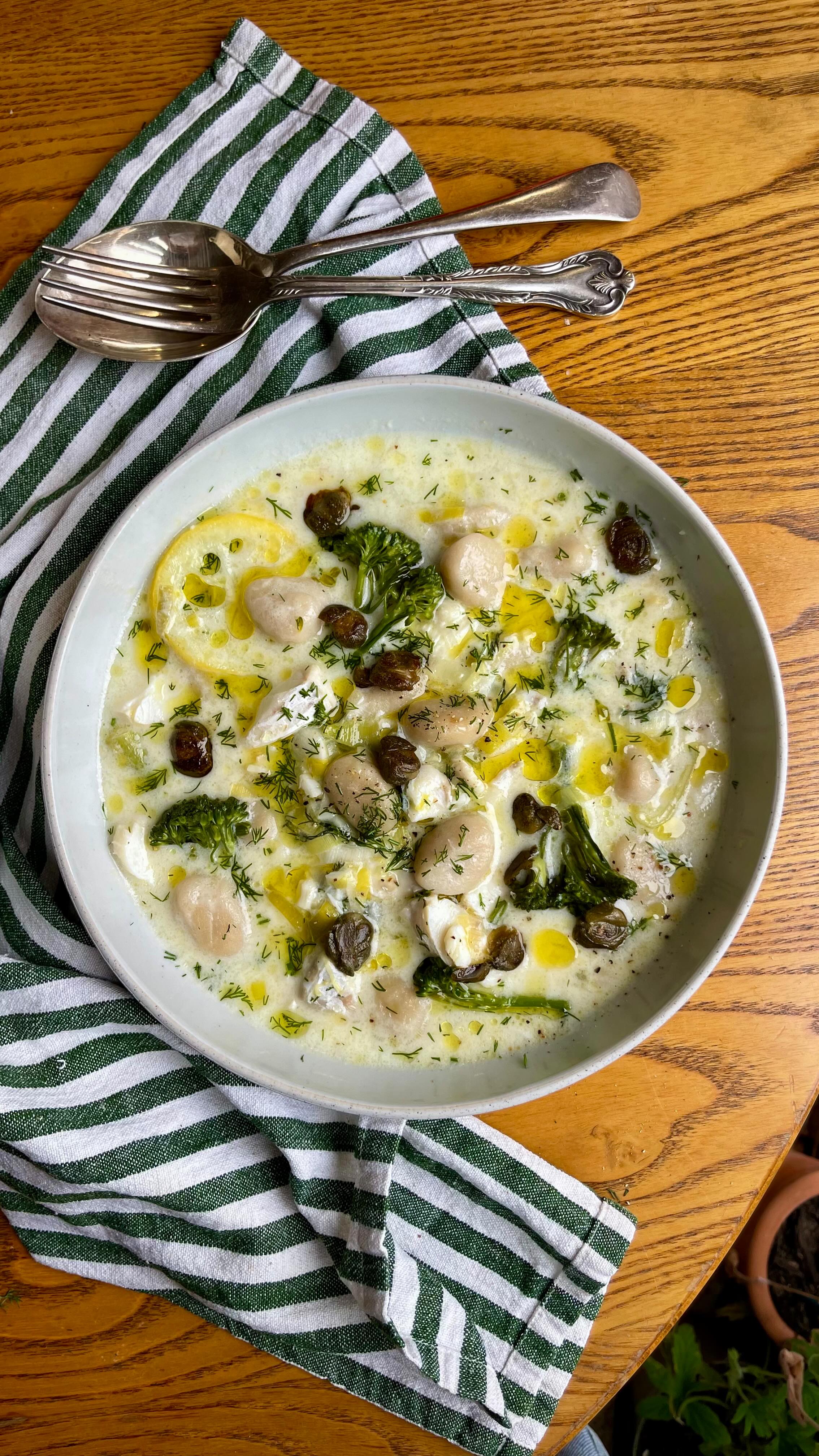 Lemony Fish and Gnocchi Broth 🐟
We’ve joined forces with @boroughbroth to bring you a delicious and warming fish broth with Sunny & Luna Cauliflower Gnocchi, inspired by a delicious fish broth recipe by @sebscrispyclub.
Packed full of veggies and herbs with a citrus kick, this dish is so tasty and perfect for a cold autumn evening.
Both Sunny & Luna Cauliflower Gnocchi and Borough Broth Sustainably-Caught Wild Fish Bone Broth have been awarded a Great Taste star - and the best part? Both can be found in your nearest big Sainsbury’s!
Reasons to love our brands - Borough Broth make delicious slow-cooked organic broth in London, and they are Soil Association Organic and BCorp certified. Sunny & Luna gnocchi is authentically Italian, rich in nutritious vegetables and count as one of your five a day.
You’ll need from @Sainsbury’s -
Sunny & Luna Cauliflower Gnocchi
Borough Broth Sustainably-Caught Wild Fish Bone Broth
Extra virgin olive oil
1 leek, washed and shredded
1 unwaxed lemon
A bunch of tenderstem broccoli
Approx 300g responsibly caught white fish
150ml cream
Dill
2 tbsp capers
Salt & pepper
Heat 1 tbsp olive oil in a large pan and add the leeks. Fry for 5 minutes or until softening and starting to caramelise slightly.
Cut 4 or 5 thin slices of lemon and roughly chop up the tenderstem broccoli into small florets.
Once the leek is done, add the lemon, broccoli and Borough Broth fish broth into the pan and simmer for 3 minutes for the broccoli to soften slightly.
Add the Sunny & Luna cauliflower gnocchi and cream and cook for 2 minutes. Meanwhile, slice up your fish into bite sized pieces and chop up some dill. (See optional step below for crispy capers at this stage).
Add the fish and dill to the pan and cook for a final 2 minutes, or until the fish is cooked and flakey. Serve in bowls with a generous glug of extra virgin olive oil, pepper and dill.
Optional: place 2 tbsp capers into a frying pan with 1 tbsp olive oil and fry until brown and crispy. Add to the top at the end (remember not to add additional salt as capers will provide a salty kick!)