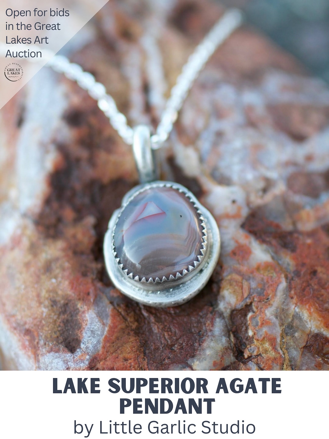 Felicia Savola aka @littlegarlic_studio works with fine and sterling silver in Marquette, Michigan. She creates one of a kind jewelry pieces. It’s her favorite to use rocks and slag from her neck of the woods: Lake Superior agates, Kona dolomite and pioneer swirl. She also works with plenty of other cabochons that are cut by small lapidary businesses.
Some words from Felicia: “I love working with Lake Superior agates. I have a couple lapidary artist friends that find, cut and polish their own agates from the shores of the Great Lakes. I like to make each piece so that it draws attention to the agate. Each piece is truly unique.”
This Lake Superior Agate Pendant is made with fine and sterling silver, the pendant is 1.5 x 1.5 cm and the chain measures 18”.
Bid today on this beautiful piece of art at www.greatlakeslove.org/greatlakesart (link in bio)
Note: some of the pieces have been cropped to fit our social media dimensions. Check out the auction page to gain the full perspective.
#greatlakesart #localart #localartist #greatlakes #protectwhatyoulove #lakehuron #lakeontario #lakemichigan #lakeerie #lakesuperior #artistsofinstagram