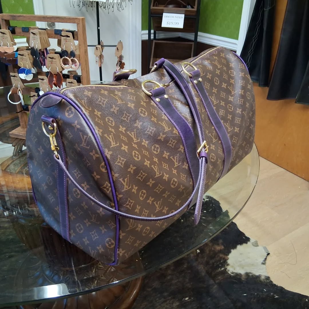 Louis Vuitton duffle bag complete redo with purple dyed veg leather before and after shots. All new purple canvass lined. #louisvuitton #vintage #leatherrepair #leather