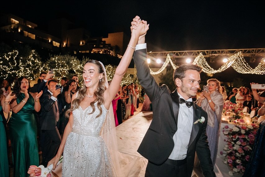 Almost a year ago, our journey began with a wonderful family from Riyadh. Sarah and Omar, together with their loving parents, Mrs. Rana and Mr. Abdulwahap, entrusted us with one of the most meaningful days of their lives and we couldn’t have been more honored. It all started with a little hesitation. Mrs. Rana was unsure about having two male wedding planners by her daughter’s side. But Sarah believed in us and that belief sparked a bond that grew stronger with every step. From the very first meeting in Bodrum, trust bloomed into something deeper: connection, laughter, and a sense of family that stayed with us until the final dance. Planning this wedding was a joy, filled with warmth and detail. Sarah was deeply involved, yet always graceful, and Omar’s calm energy balanced every moment.
And then came the wedding day. Rain surprised us just before dinner we huddled under umbrellas, protecting the setup, holding our breath. But as the clouds parted, magic unfolded. The Bodrum Edition, nestled on the stunning Yalıkavak coast, turned into a stage for one of the most elegant and heartfelt weddings we’ve had the privilege to plan. From the air, the view was breathtaking floral petal designs on the ground mirrored the soft blooms in the décor. The dinner setup glowed under the softest lighting, and the dance floor was never empty again. From the moment the music began, guests danced under the stars until the very last beat thanks to an unforgettable lineup of world-class DJs. This was more than a wedding. It was a story of love, resilience, family, and celebration.
To Sarah & Omar: we adore you. Thank you for letting us be a part of your story. Here’s to the memories, the music, and the magic. Forever grateful.
📷 @puciwed
#SarahAndOmar #KaremEvents #TheBodrumEdition #YalıkavakLove #TrustInTheProcess #FloralElegance #AerialMagic #FromRiyadhWithLove #WeddingsWithSoul #DesignInBloom #KaremMagic