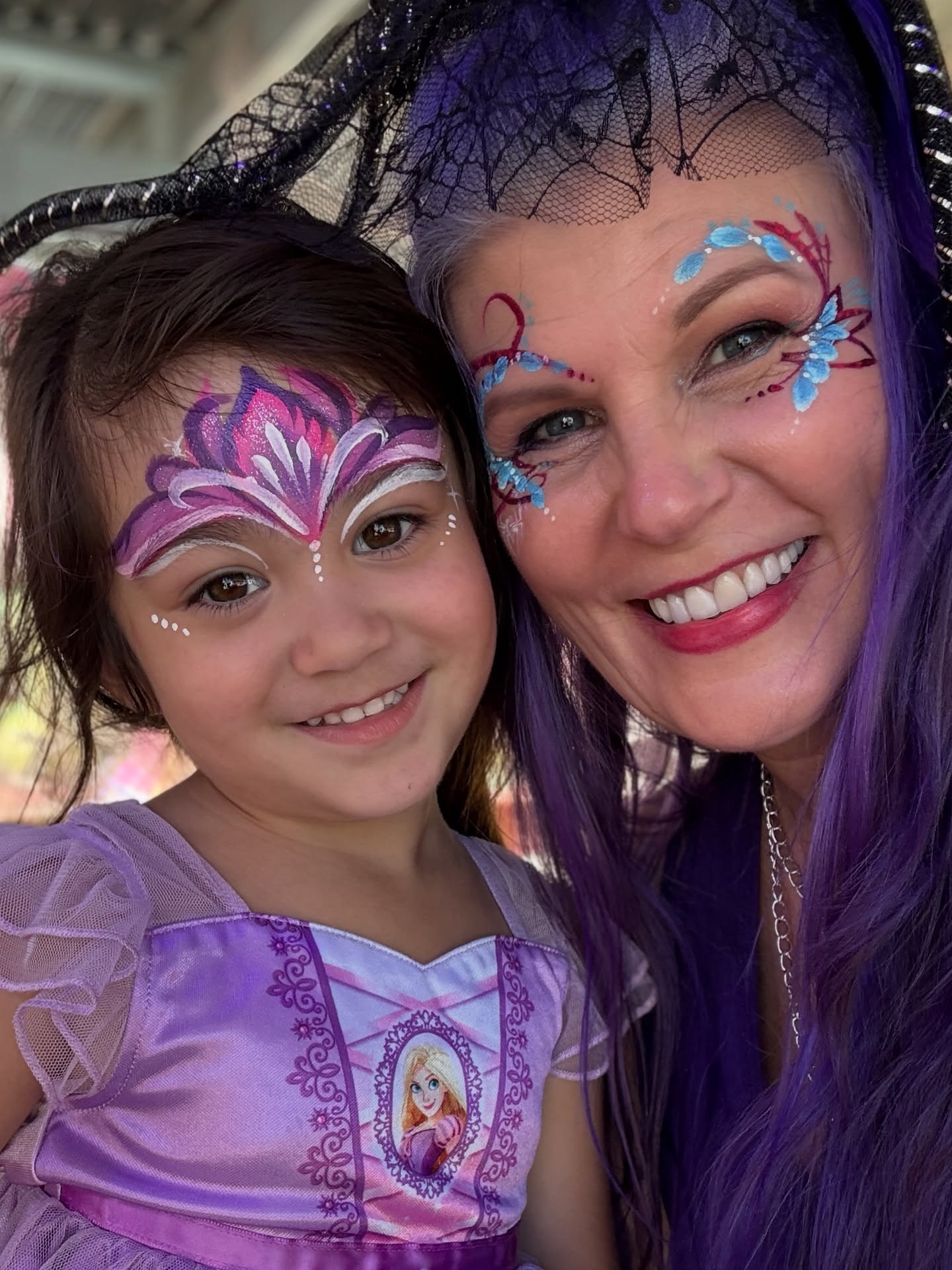 This little girl got her first face paint from me! I love introducing them to a great first experience and seeing how proud they are of their newfound bravery!