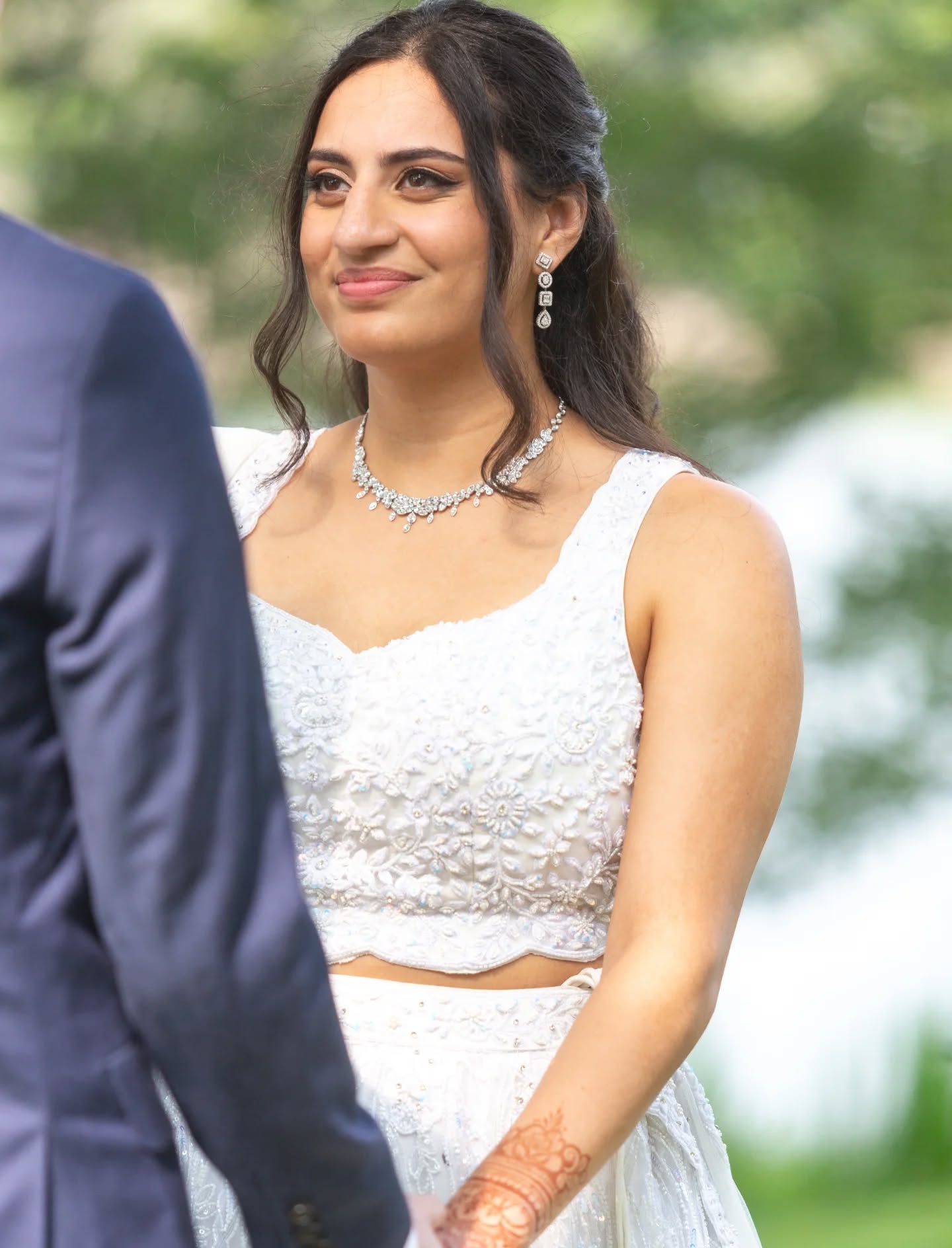 Ayesha's bridal lehnga was designed and adorned with intricate white beadwork that catches the light with every step. The look blends timeless elegance with delicate craftsmanship, creating a modern fairytale moment for the bride’s special day. Thanks @ayeshakrovi ❤️❤️
Outfit:@crossoverchicago
Planner:@burstweddings
Photography:@jordanaveryphotography
HMUA:@rarebirdbeauties
Florals:@vetiverandvine_beverly
Mehndi:@nidaz_henna
To design your bridal or partywear outfit
Email:mandeep@crossoverchicago.com
#whitebridaldress #bridallehenga #fashionstyle
#CustomOutfit #fashionista #bride #bridalinspiration #weddinglehnga #fashion #desibrides #punjabibride #pakistanibride #weddingparty #whitelehnga