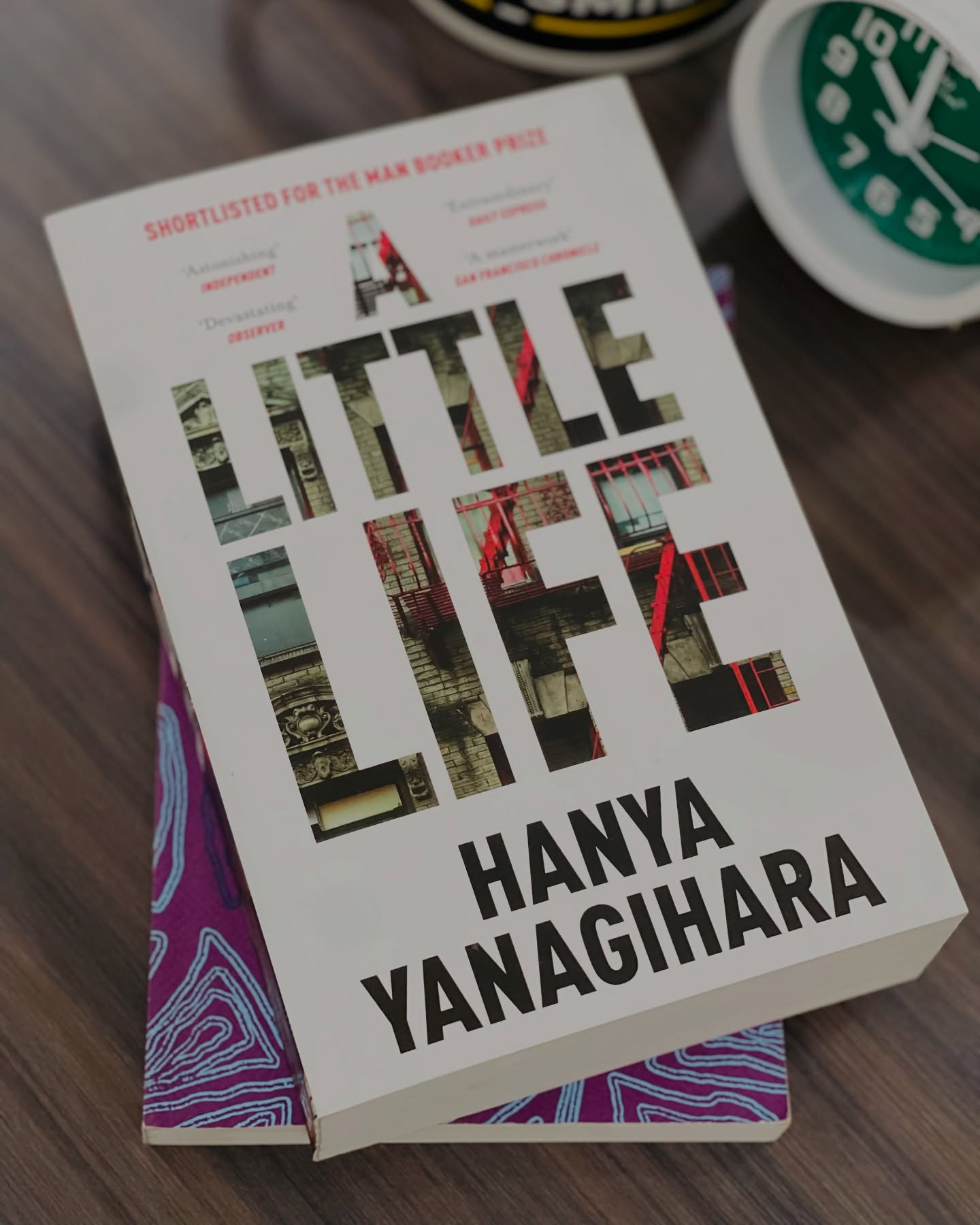 I really should have learned by now not to buy into the hype, but I’m an easily influenced bookish human, and our Bookclub WhatsApp chat made me do it! The group was on fire about this one, so I caved, bought it immediately, and started reading (after years of resistance). We didn’t even have it in stock at Soma Nami, so yes, I cheated on my own bookstore. Peer pressure is real!
I went in expecting heartbreak, tears, emotional devastation- the full spectrum- and maybe those high expectations worked against me. I kept waiting for that emotional gut punch, the moment everything would unravel…but it never quite landed the way I imagined.
That said, I loved the build-up. Hanya takes her time setting the stage and developing her characters (I’m both a character and plot reader), and that part completely drew me in. She lets us live inside the lives of JB, Malcolm, Willem, and Jude, and by the time the story truly begins, you already feel tethered to each of them. But therein lies the frustration, everything else unfolds just as slowly. The pacing makes the 700 pages feel even longer. I did appreciate following them from their late teens into their fifties, but the slow burn sometimes tested my patience.
There were moments of deep sadness that really stayed with me, especially when Jude was met with pure, unconditional love (spoiler alert), like when Harold and Julia adopted him at 30. Those moments tugged hard at my heart.
If I had to sum up my thoughts: A Little Life is, at its core, an exploration of the extremes of humanity - the boundless capacity to love and to endure. Jude’s circle surrounds him with relentless devotion, loving him without question, even when he isn’t particularly lovable.
Jude himself is as complex as they come. Life dealt him such a cruel hand that reading his story often felt unbearable. My lingering question was simply: why did he hold on for so long?
I’m curious, if you’ve read this, what was your own experience with this book? What stayed with you most?
#alittlelife #hanyayanagıhara #reflections #review #books