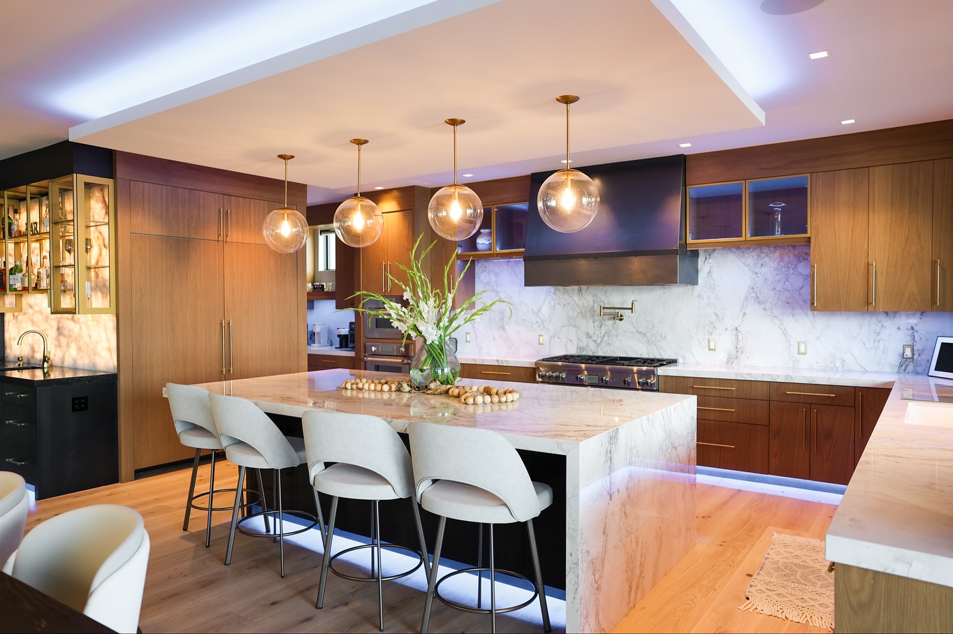 Step inside and you’ll see why this home feels unforgettable from the moment you walk in. ✨🪴
A full-ceiling fireplace draws your eye upward, grounding the open living space in warmth and texture. The kitchen — complete with a massive island — flows into a glowing bar that turns into a work of art as the countertop continues up the wall. Add a custom metal staircase, a private golf simulator, and bathrooms that each have their own unique design twist… this home is a dream brought to life.
#RameyConstruction #CustomHome #LuxuryLiving #ModernDesign #NorthIdahoHomes #DreamHome #InteriorDesign #ModernInteriors #CraftedWithCare