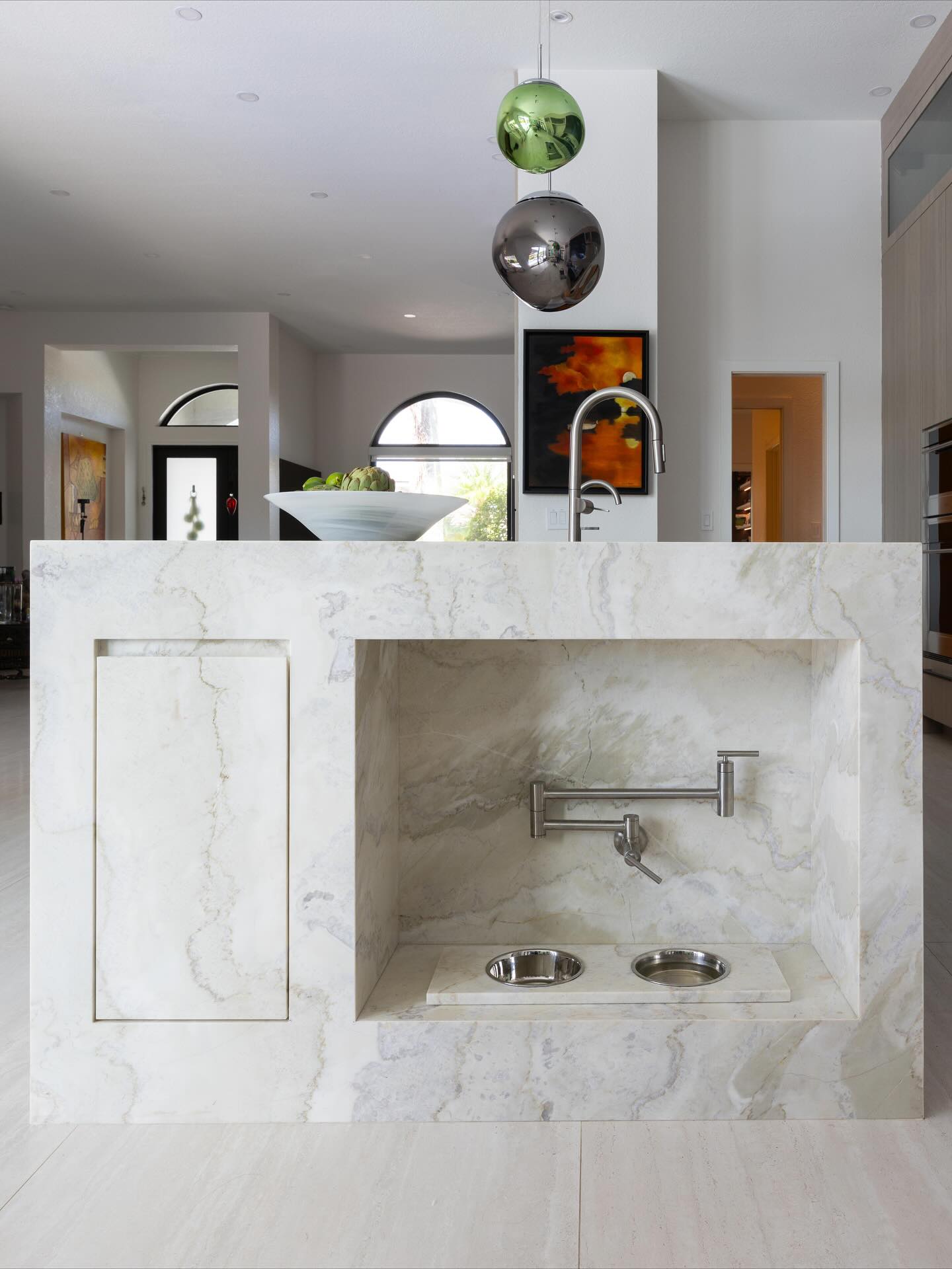 Even the smallest members of the home deserve thoughtful design. 🐾
This built-in pet station and buffet area next to the kitchen were crafted to blend functionality with charm while keeping everyday routines seamless and beautifully integrated.
Custom millwork on both areas hide storage for supplies, while the base niche provides a practical spot for feeding. The #TajMahal quartzite and clean lines keep it cohesive with the kitchen’s overall design language, proof that luxury lives in the details.
Design: @mldesigninteriors
Millwork: @earthsourcedesign
Photography: @laurenalexis.photo
#PetStation #CustomCabinetry #KitchenDesign #InteriorDesignStudio #LuxuryInteriors #WestonKitchen #DesignDetails #PetFriendlyDesign #HomeBuffet #ModernCraftsmanship #MLDesignInteriors #FunctionAndCharm #CraftedForLiving