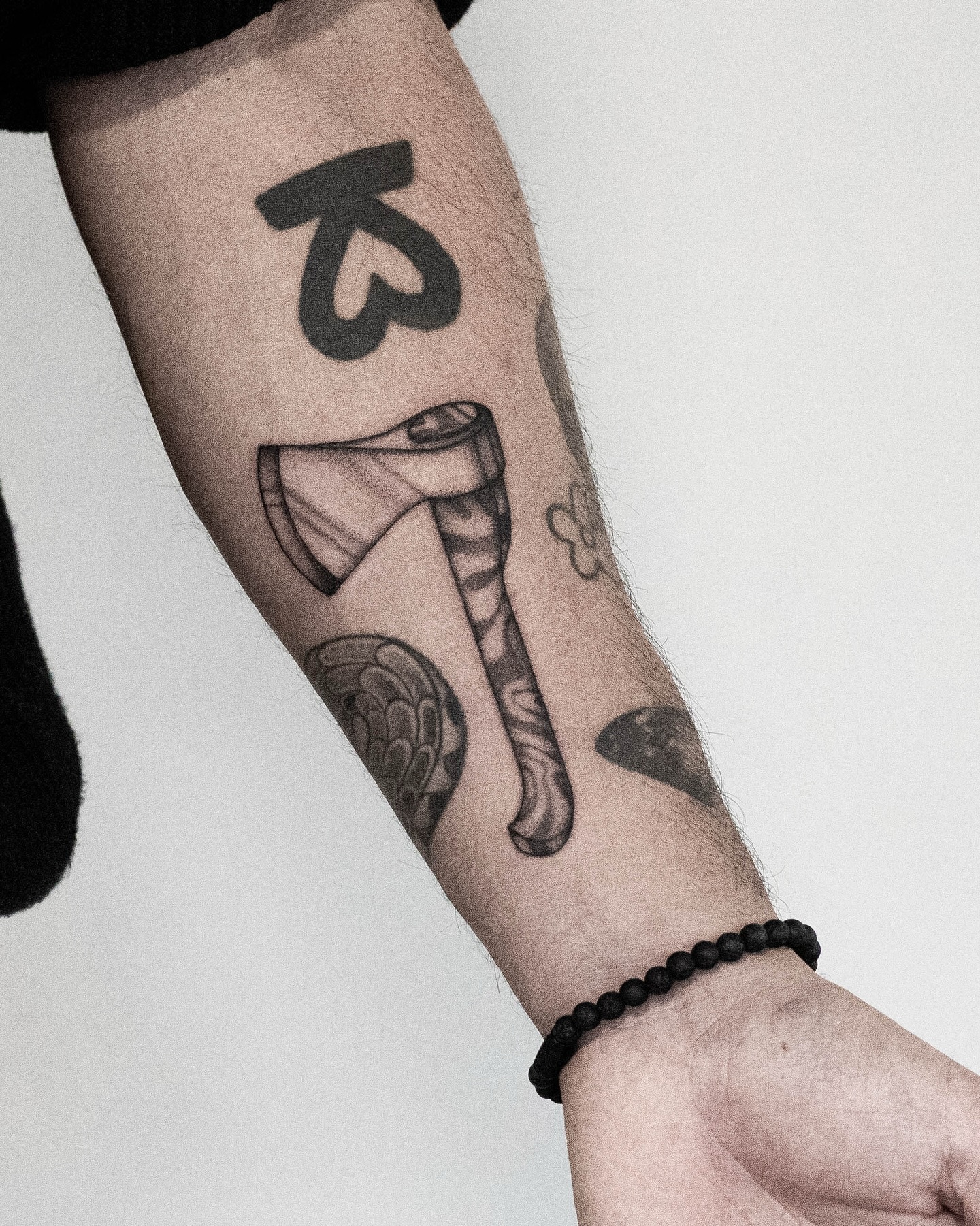 As a memory of their annual trip to the Ardennes, these two friends chose to get a matching axe tattoo, with the pattern of the Ourthe river flowing through the handle. Thanks for stopping by guys.
#blackworktattoo #tattooart #tattoodesign #flashtattoo #dutchtattooer #eindhoventattoo #tattooeindhoven #illustration #dotworktattoo #graphicdesign #moderntattoo #blackwork #finelinetattoo #minimalistictattoo #surrealism #abstracttattoo