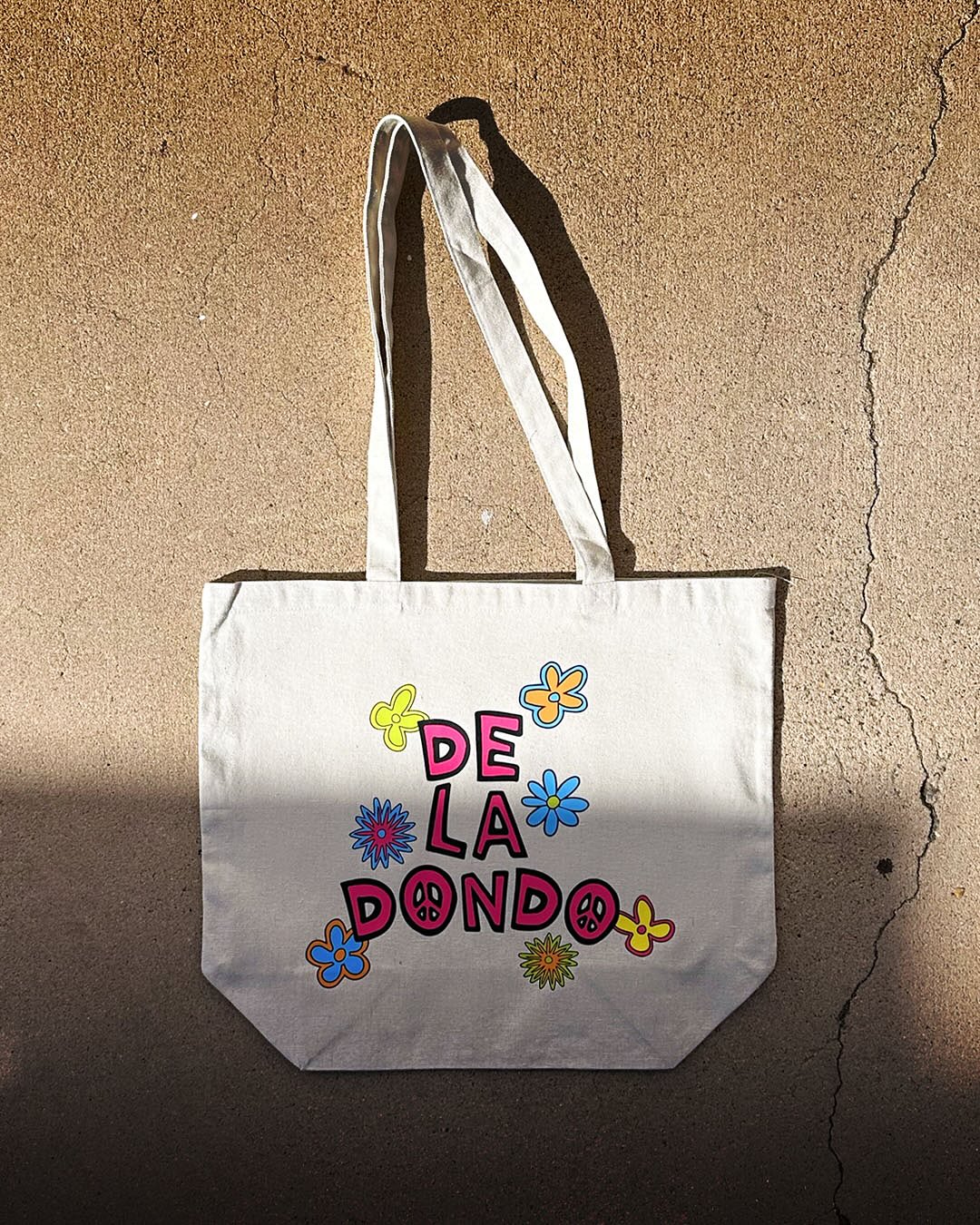 FREE DE LA DONDO TOTE ON ALL ORDERS OVER $50
~ 10 oz. recycled cotton canvas
~ 15”H x 17”W x 6”D
~ 32” long straps
➡️ dondobeachmarket.com/themarket
⬆️ Link in bio
#supportsmallbusiness #dondobeachmarket #dbm #merchmaker #embroidery #customembroidery #heatpress #design