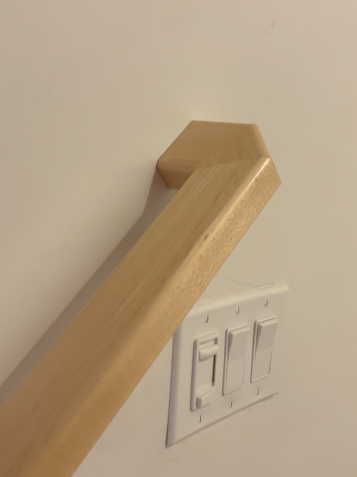 Maple stair railing, iron balusters, paint grade wall caps, maple Newell posts. #finishcarpentry #coloradosprings #renovation #broadmoor #trimcarpentry #craftmanship