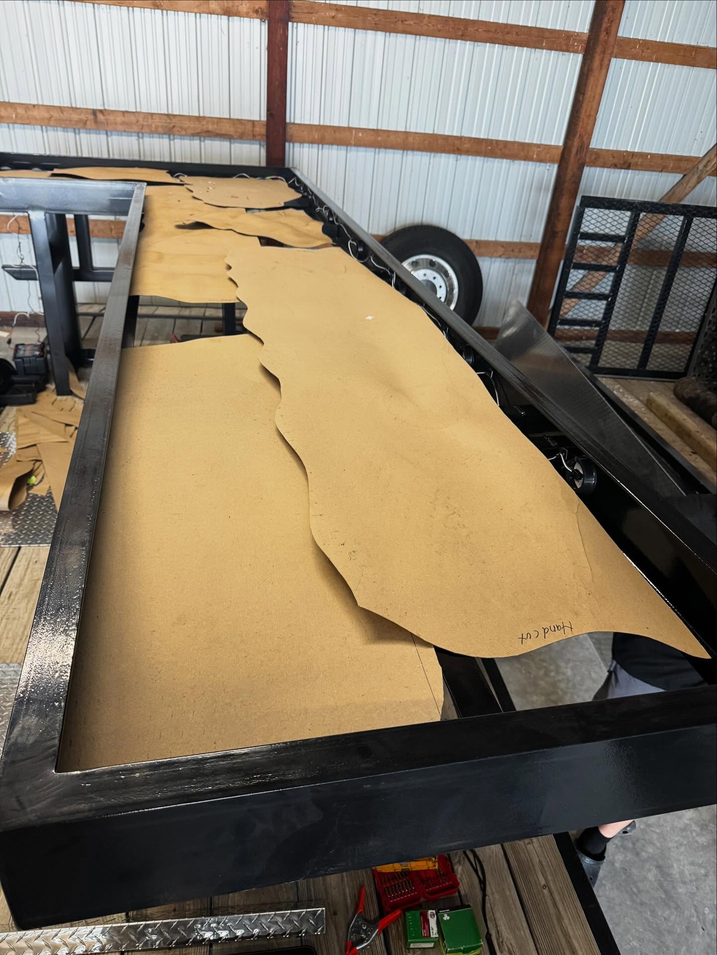 Weeks of planning have gone into this project and this week we officially started! This 14ft x 3ft (L shaped) tractor trailer frame is our canvas 🚚 Day 1 we spent 6 hours building a custom mold that sits level to the bottom of the steel rails. Day 2 we spent 4 hours cutting and shaping White Oak slabs to fit the clients vision. @superclearepoxy (deep pour) arrives Monday and then the fun will really begin. Can you guess how many gallons of epoxy we are slated to use in this one? 🤔#truckersofinstagram #truckerforlife #customwoodwork #customeoodworking #bartop #barlife #custombar #tractortrailer #fyp #epoxybar #epoxyresinart #deeppourepoxy #superclearepoxy #ironwork #steelwork #whiteoakwood #woodslabs #liveedgeslab #smallbusiness