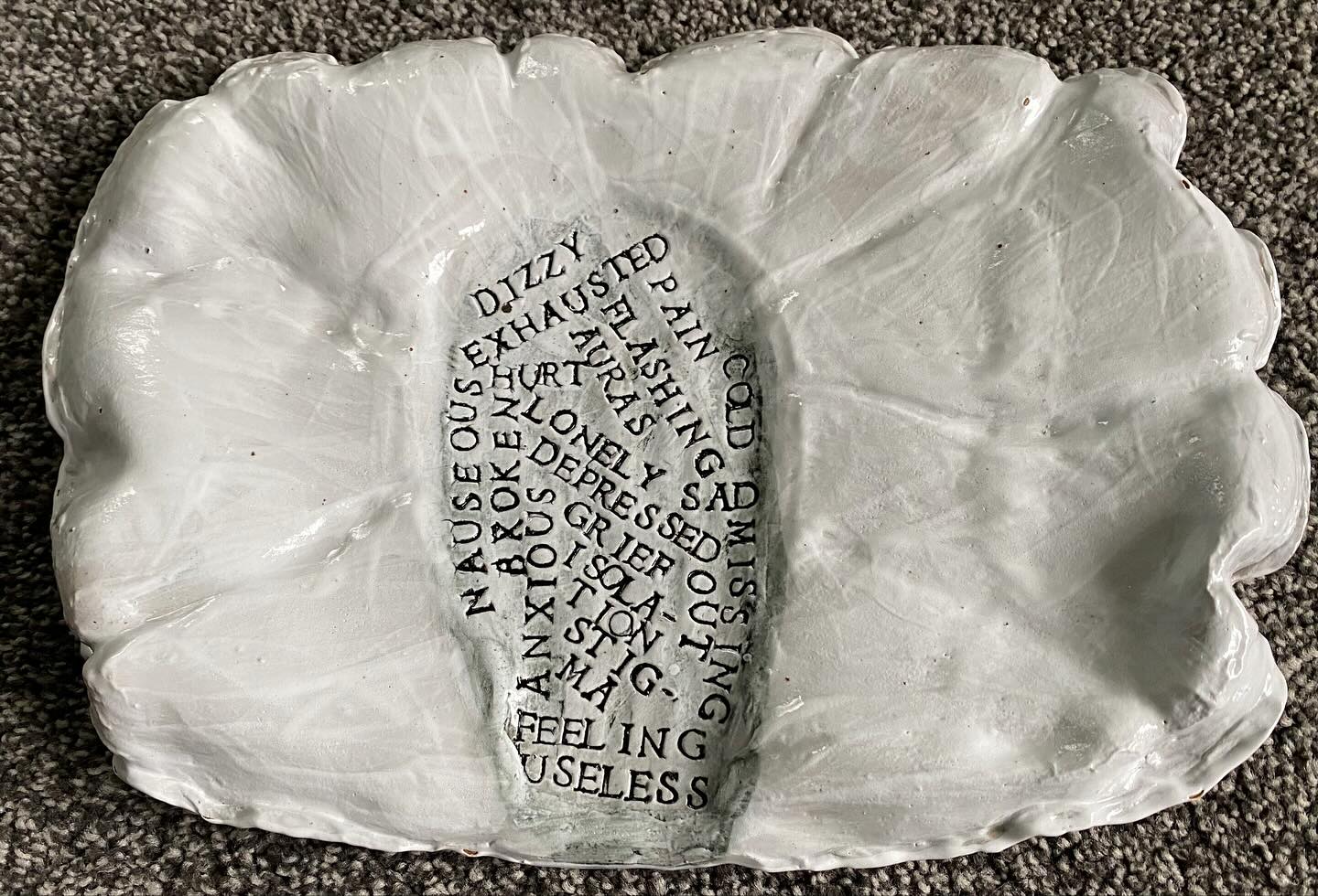 Front and back (to show the title) of the first try at making a pillow out of clay. It looks cool, but I am going to try again to see if I can refine it a bit. It seems quite timely to have this come out of the kiln right when I am struggling to get an appointment for my treatment that I fly up to Auckland every three months to get. I was told that the clinic was full for the month, eventhough I am due for the treatment on the 20th. Now I will have to wait until sometime in December, meaning quite a few weeks overdue. Not looking forward to having to live with more pain and meds. Plus the December clinic isn’t a sure thing so it could be I have to wait until January! Not going to be a good Christmas if that happens. This is what happens when there is only one doctor in the whole country with limited public health spots for treatment🙄Even if I went private I would have limited access to this particular treatment and then I would be paying for flights to Auckland and the private charge every three months. 😞#sadandangry #hopingfortreatment #publichealthmatters #migraineawareness #migrainewarrior #migrainessuck