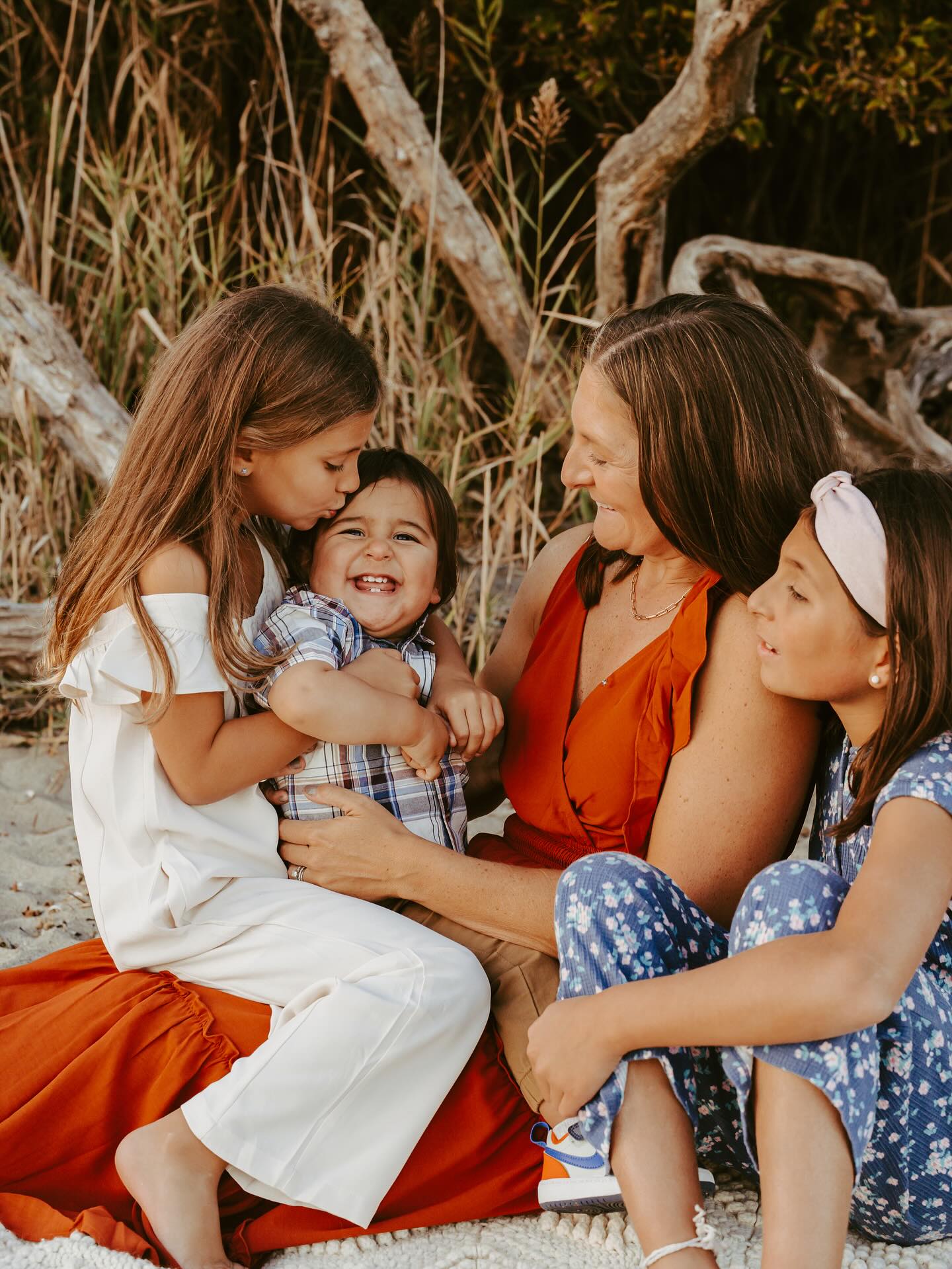 Can someone tell me how it’s already November?! So crazy! I have a bunch of fall sessions to share with you all, and today’s is…you guessed it a fall beach session! I think dark red might be my favorite color for beach sessions in September and October, it compliments the area so wonderfully! I had the pleasure of taking this beautiful families photos for the first time, and it was such a wonderful evening!