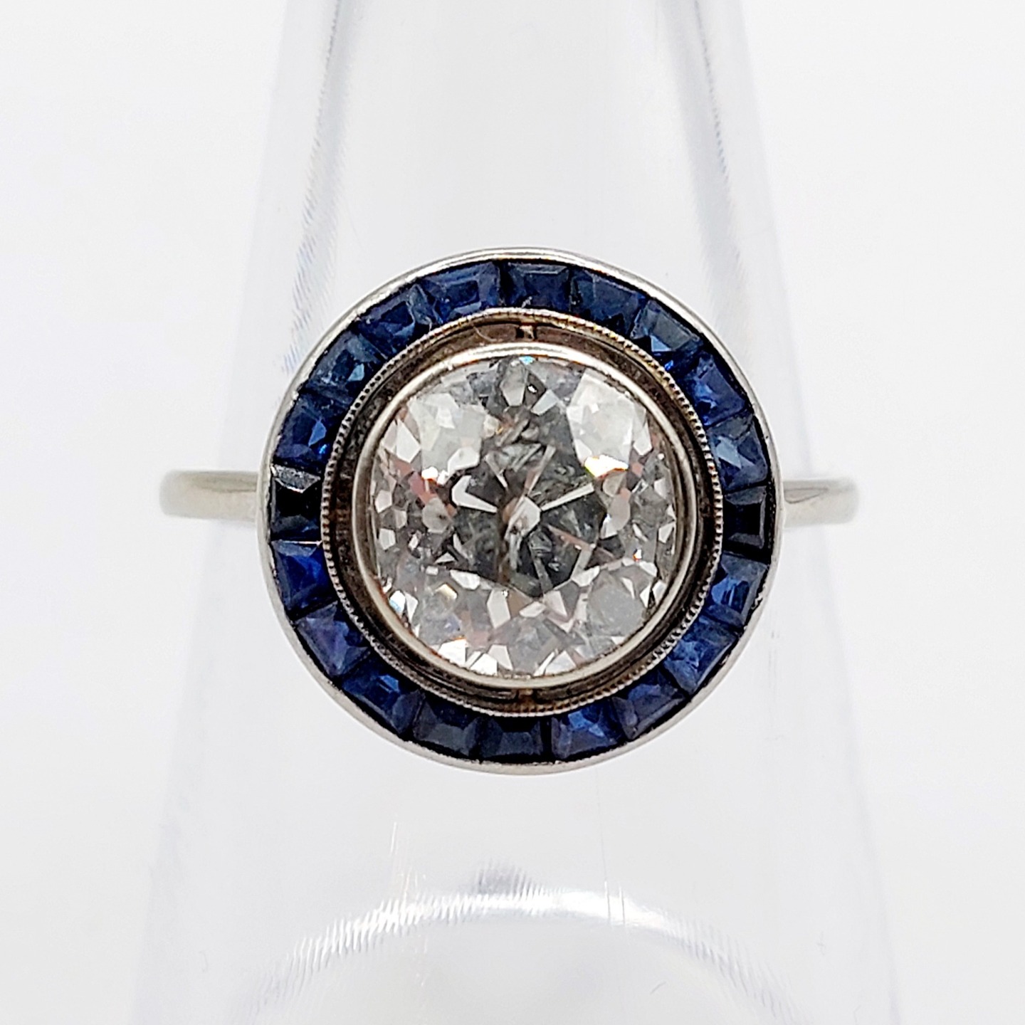 French Art Deco target ring 18k white gold set with a 2.40 carat old european cut diamond surrounded by calibrated sapphires (circa 1920)
PRICE : 7000€
Magnificent and rare work by a French goldsmith from the Art Deco period
Size: 57.5 FR / 8.25 US (resizing possible at a jeweler)
Weight: 3.85 g
Diamond size: approximately 8.6 x 5.9 mm (estimated at 2.40 carats)
Diamond in perfect condition, white in color, European old cut, with visible inclusions (some visible to the naked eye)
Ring head size: 14 mm
Slight wear to the sapphires visible only under magnification
Minor scratches from use and traces of previous resizing
Owl hallmark (French hallmark)
#frenchjewelry #diamond #diamondring #antiquering #victorian #victorianring #marquisering #augustusjewels #vintagering #daisyring #daimondhaloring #tragetring #oldminecut #oldminecutdiamond #oldeuropeancutdiamond