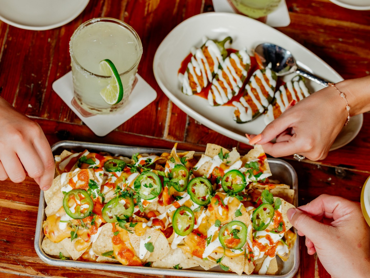 It’s National Nacho Day, and we’re fully committed to the cause. Grab a margarita and make it official. 🔥