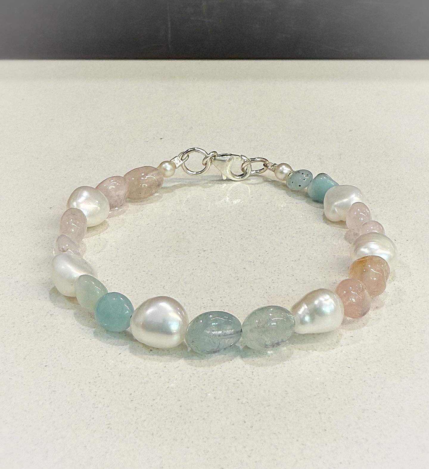 Our Beryl bracelet features freshwater pearls, aquamarine and morganite with a sterling silver clasp, new to stock…