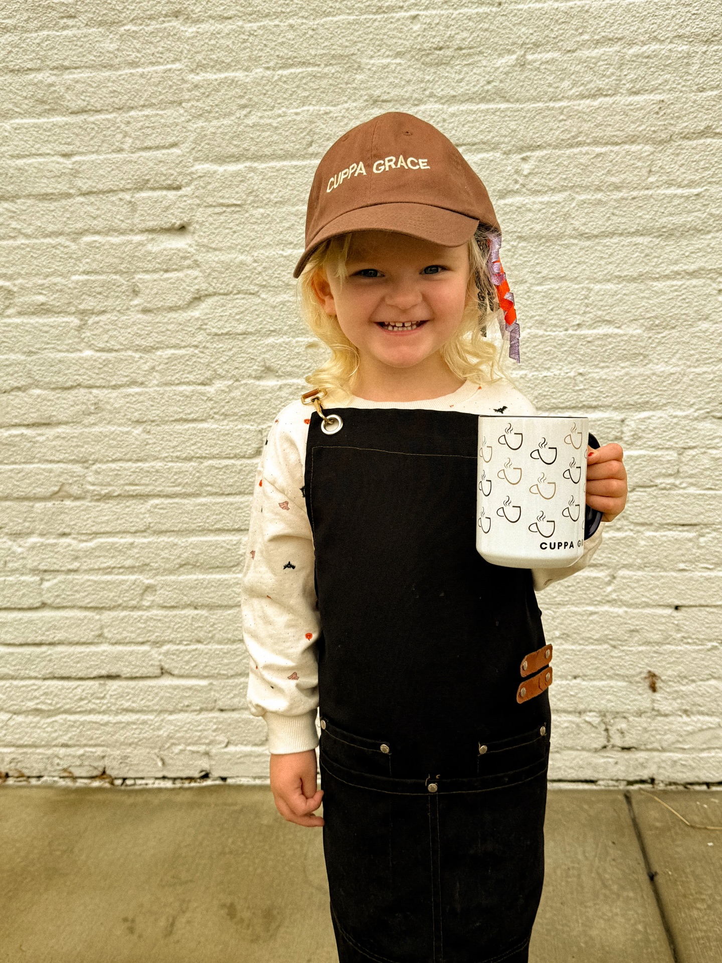 From concept to coffee shop shelves ☕
When the new owner of @cuppagracecoffee, Heaven, took over earlier this year, she wanted a look that reflected the warmth and community her café is known for. We partnered with her to create a custom collection of hats, tees, and mugs that bring her brand to life in a simple, authentic way.
Seeing her team and customers proudly wearing these pieces is what it’s all about. Turning a logo into something that builds connection and belonging.