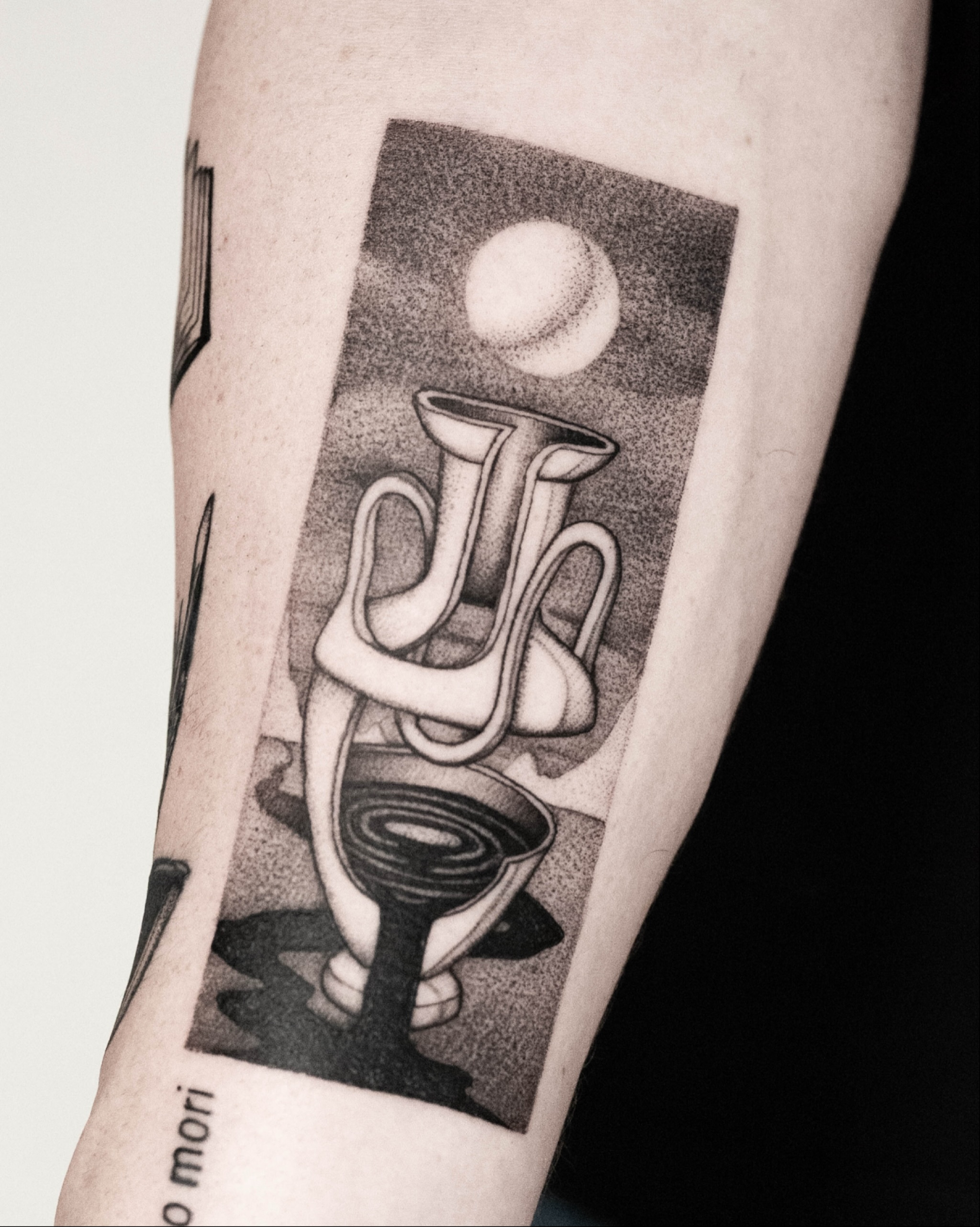 I sometimes get asked what these vases represent. To me, they symbolise the merging of the inner and the outer, how one flows into the other. The idea comes from a philosophy that plays an important role in my life. It originates in India and is known as Advaita, which literally means “not two”. It speaks of non-duality: the separation we feel between the self and the world is only an illusion. If you’d like to know more, feel free to send me a message.
Thank you Cris, it was great meeting you and I look forward to seeing you again in January.
#blackworktattoo #surrealism #spiritualtattoo #tattooart #tattoodesign #flashtattoo #eindhoventattoo #tattooeindhoven #dutchtattooer #illustration #dotworktattoo #graphicdesign #blackwork #psychedelictattoo #minimalistictattoo #abstracttattoo #contemporytattoo #finelinetattoo