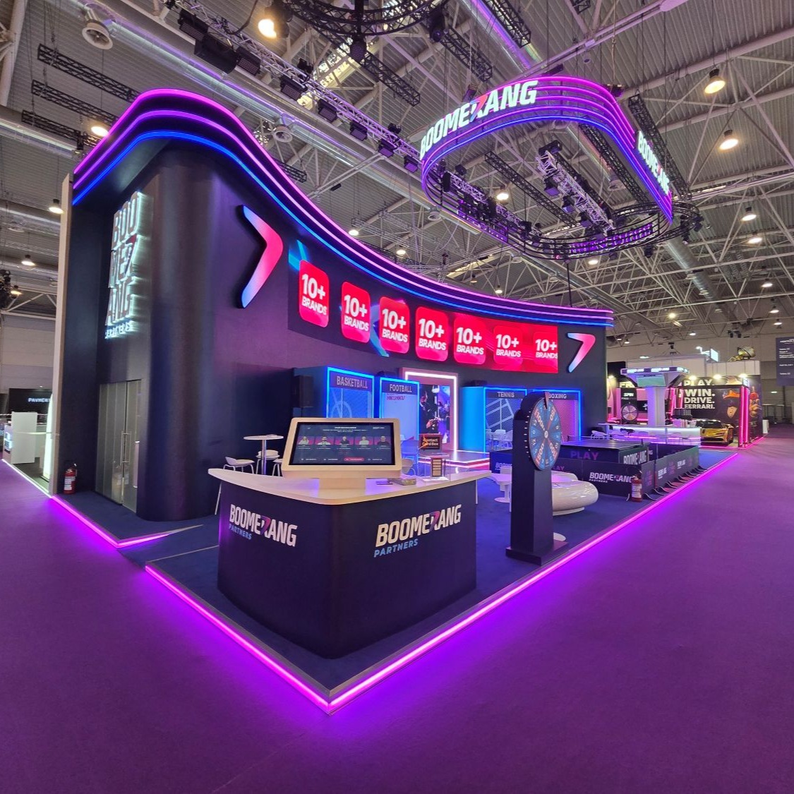 We've been quietly gearing up for our biggest project of the year - providing manufacture and build assistance to creative partner @winningexhibitions and their client Boomerang Partners. 🛠️
This is the first time we've attended Sigma Central Europe and venue Fiera Roma in a few years, and (although working in Italy brought all kinds of new administrative and logistical trials) as always, our fantastic production, workshop and onsite teams rose to the challenge; the build went without a hitch and we were glad to be back on the hall floor doing what we do best. 👷🏻♂️
The stand itself stood at 6m high, incorporating complex electrical and rigging requirements, but all the hard work paid off and it was all worth it just to see that mesmerising LED bring the stand to life 🚥 ✨
As the show comes to a close, our operatives are on their way back to Rome now to break it down - such a shame to see it go, but it's been a great experience and we hope to have the opportunity to get involved in many more projects of this calibre and scale in the future. 💪🏻
@sigma.world @fieraroma @romafiera
#fieraroma #boomerang #europe #italy #gaming #events #exhibition #sigma #LED