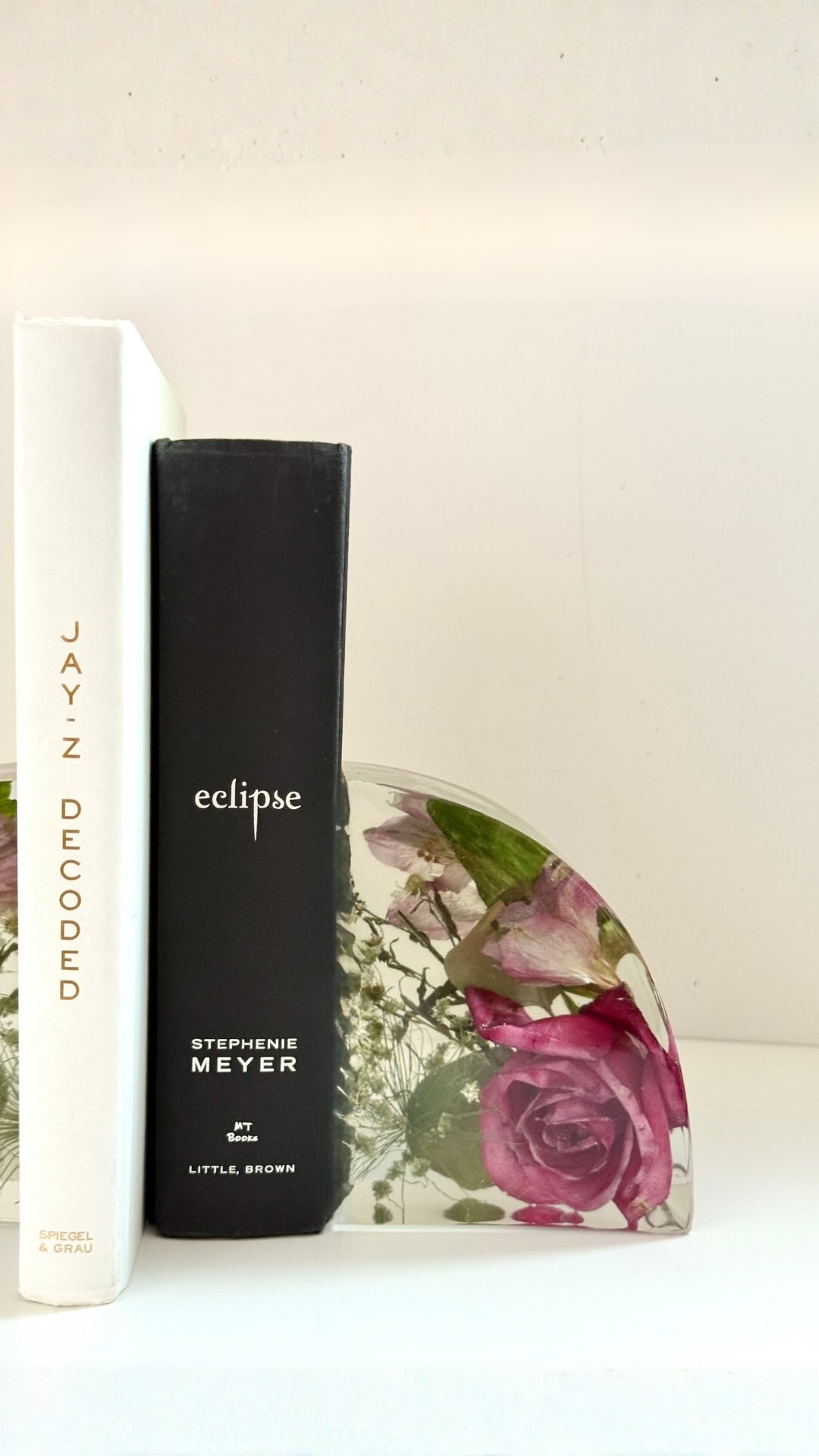 What a functional way to preserve your flowers and display them! ✨
We have now launched Bookends and these can be customized in different shapes too! We are making a pair in heart shape 👀 Stay tuned!
If you are also looking to preserve your memories, forever- DM us today!
#weddingbouquetpreservation #resinbookends #bookends #resindecor #weddingkeepsake