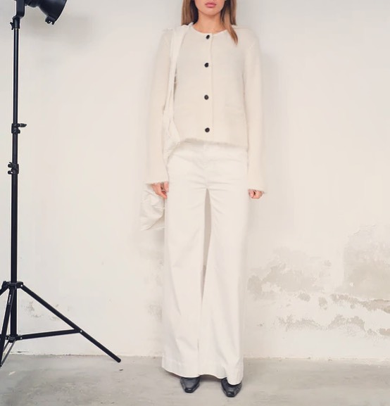 Mix your white jeans with a fluffy knit for a comfy transitional outfit. #fall25fashion