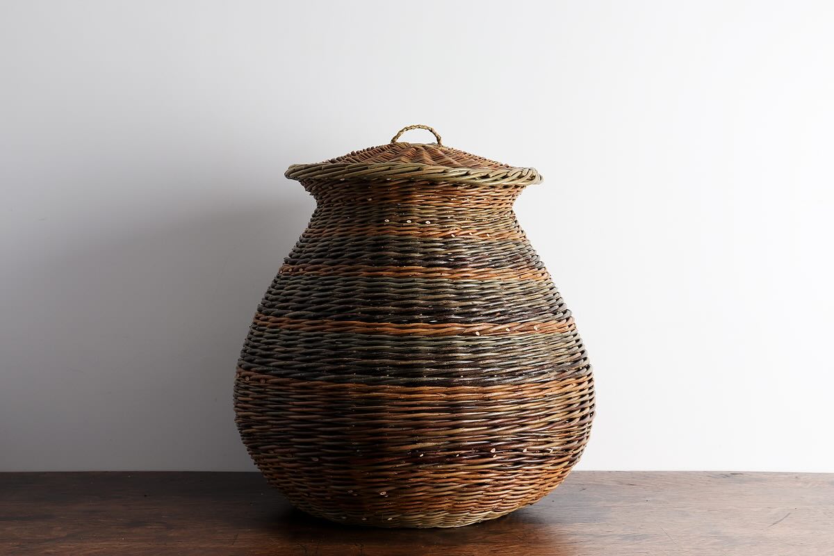 A new colourful and curvaceous basket.
This one was a real test for my hands - both in terms of controlling the shape as well as working with relatively thick willow. This silhouette has been in my mind for some time now, so I’m pleased that I found and allowed myself the time to try it again.
On previous occasions, the shape went too wide at the start for me to be able to create a taller form, but with a combination of a bit more experience, plenty of perseverance (plus a little magic), it finally came together in this piece.
Sarah