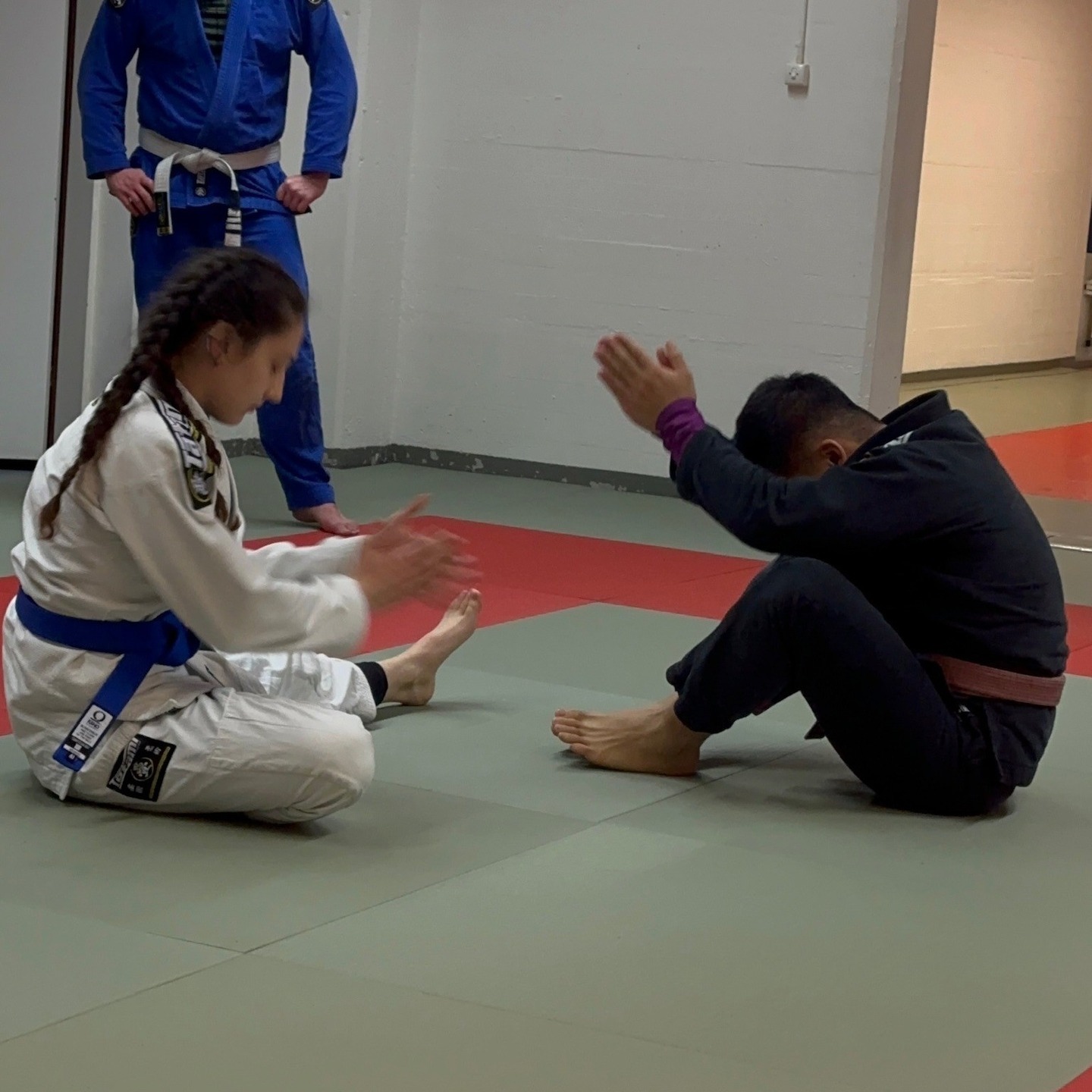 In BJJ as in Shintoism we clap before presenting our opponent with an early departure of life through exempli gratia a tight rear naked choke. This concept, nay tradition, is beautifully demonstrated here by Coach Khai.
(don't take this to heart please, it's a joke - come visit the gym)