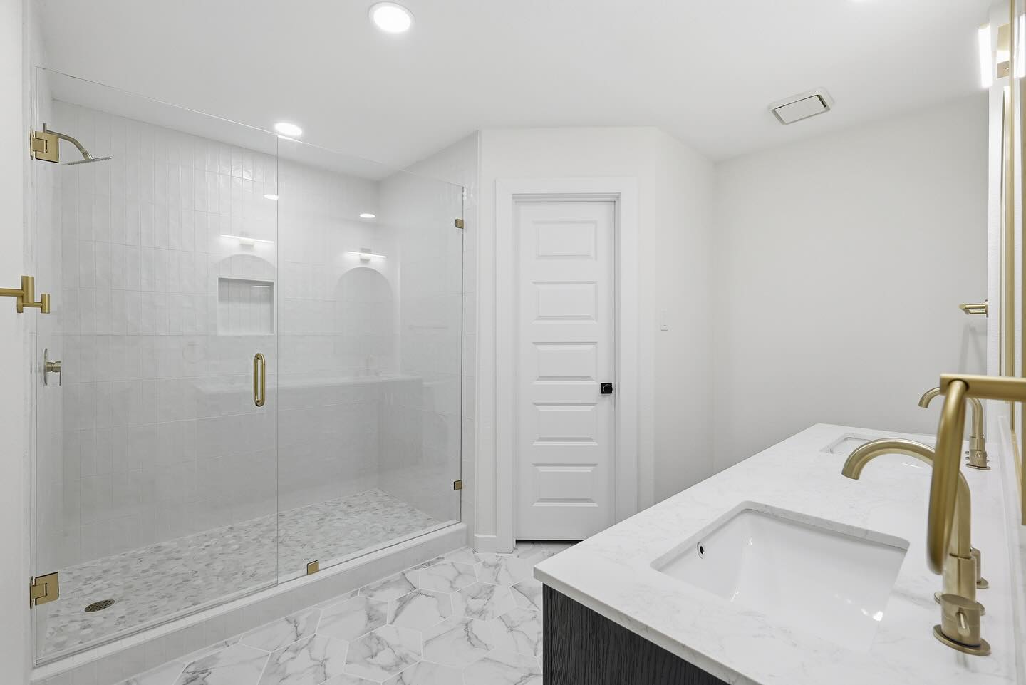 You can’t go wrong with a large shower! This bathroom refresh is giving spa ✨ #bathroomremodel #dfwremodeling
