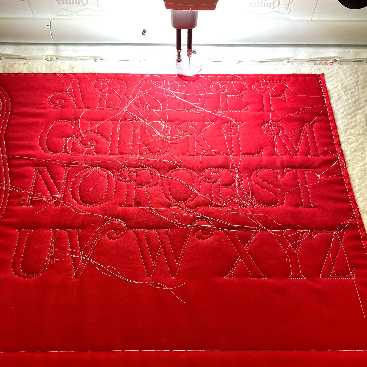 Playtime today - stitching out the Noel alphabet from A Bit Orange ❤️
Testing various starts and stops and still reverting to the good old knot and bury - it gives the cleanest finish, especially with strong contrast between solid red fabric and light 40wt thread, but it does take the most time …
Hope to get some more quilting time tomorrow 🤞
#cutandalterlongarmquilting #longarmquiltinguk #longarmquilter #cutandalterstudio #prostitcherpremium #handiquilteramara #quilting