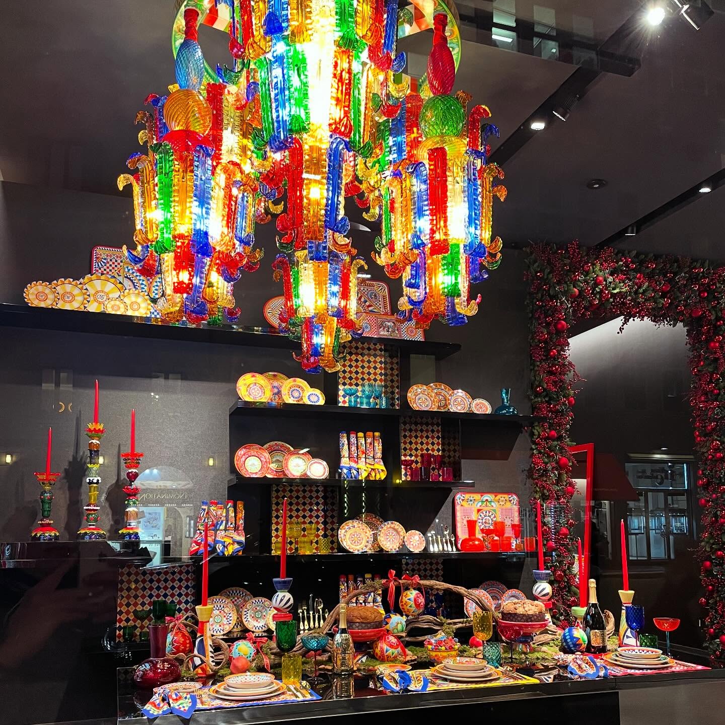 @dolcegabbana_casa store in Milan is a true demonstration of extravagant #italianità. Beautifully dressed tables and furniture are the stage of a colourful #christmas, where fashion and food merge harmoniously. The house showcases a full range of panettone, chocolates and wines displayed in multicolor boxes for some #eyecatching yet affordable presents. Showing that food is maybe on its way to become the new ‘lipstick’ of luxury?