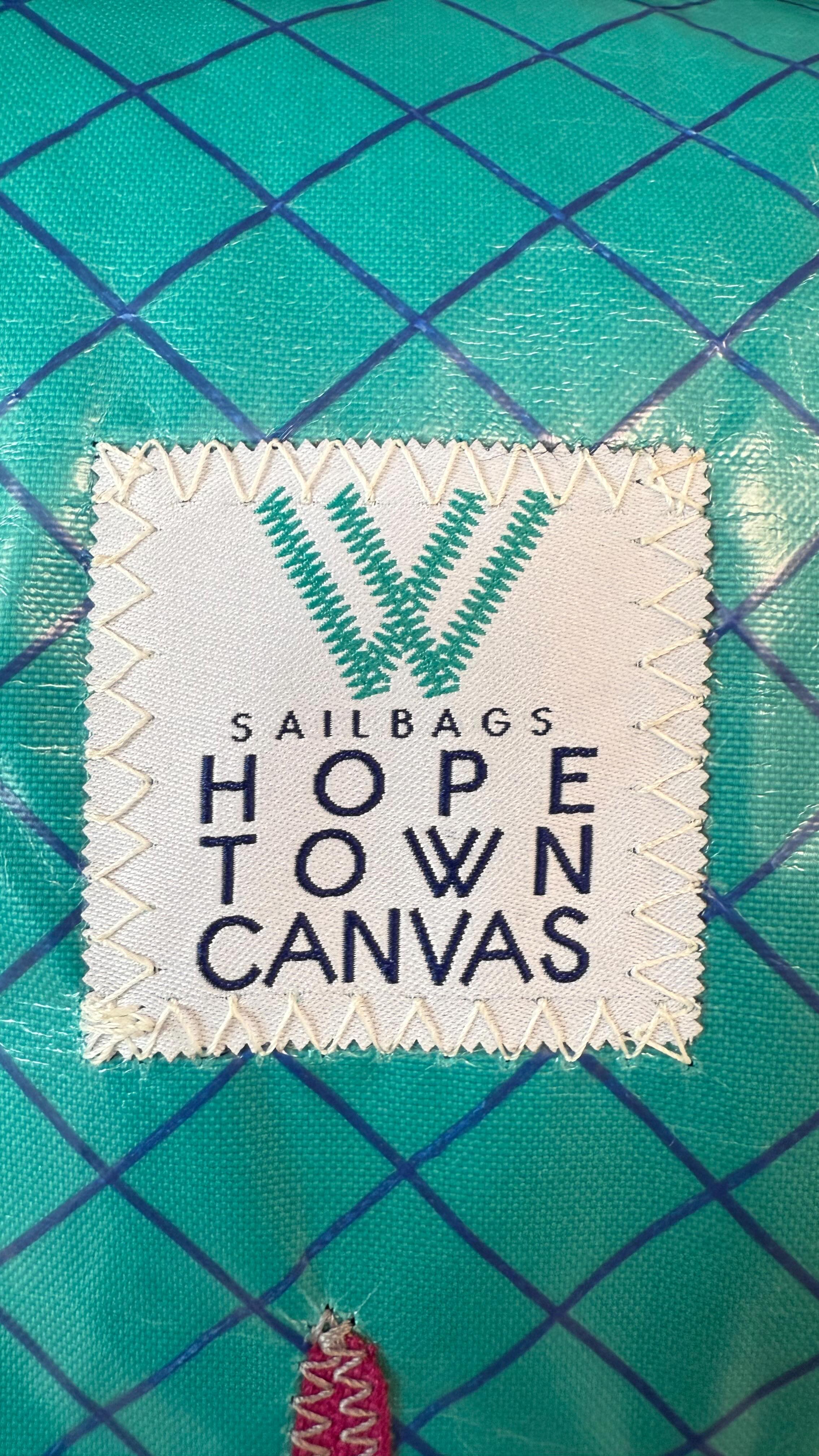 Each sailbag is unique, yet each one carries the same thread. A shared story, stitched with the same care, purpose, and a piece of Hopetown.
Shop our collection of one-of-a-kind sail bags on wsailbags.com