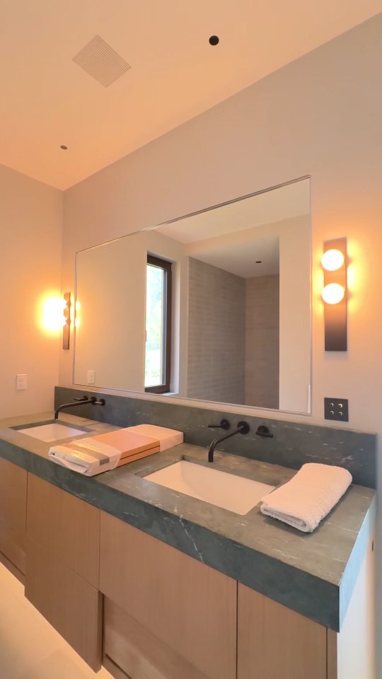 The details that make a space come alive.
In the guest house bathroom, the lighting is intentional and includes labeled controls for ease of use, especially for first-time guests.
#sawteethcarpentry #guesthouse #bathroomdesign #customhomes #adirondackbuilds #essexny #craftsmanshipmatters #behindthebuild #buildingprogress