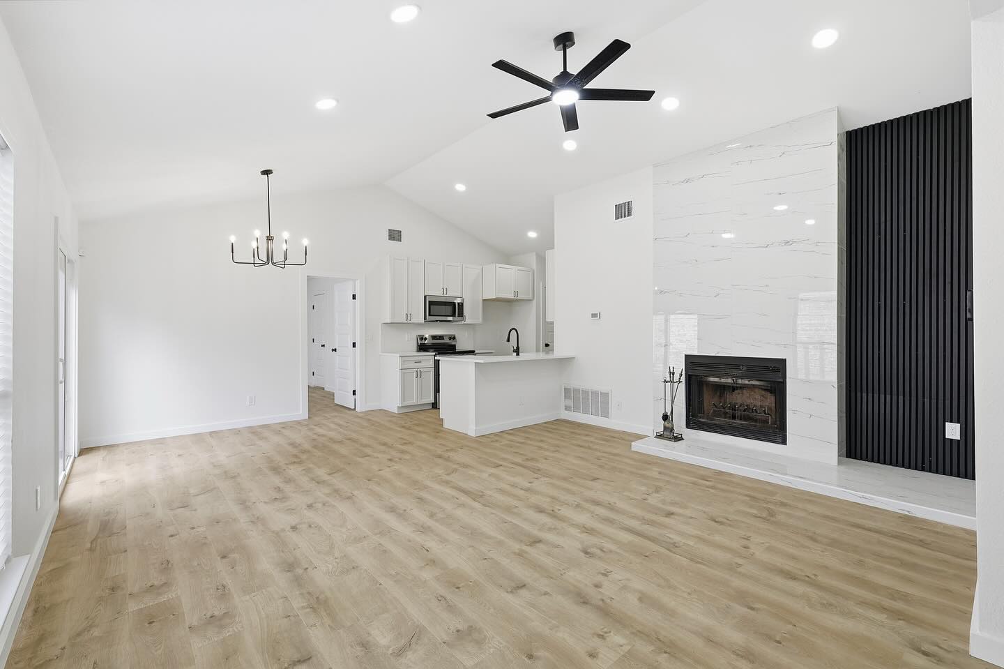 This client wanted a simple yet elevated living space. The details of the accent wall paired with this timeless kitchen is a great touch to this little bungalow. #homedesign #dfwremodeling