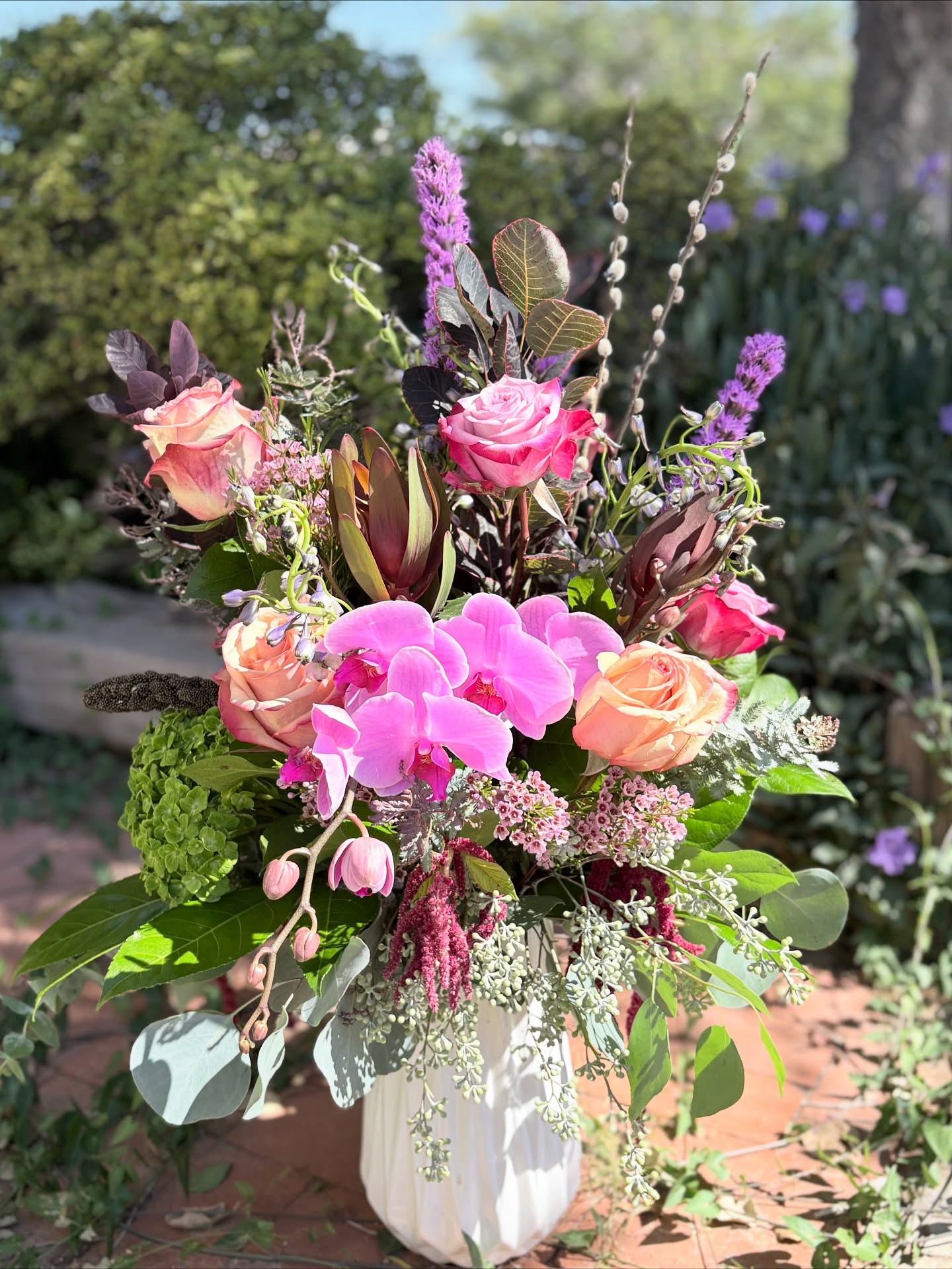 Where elegance meets every occasion — lush orchids, roses, and hydrangeas gathered in a graceful white vase, ready to celebrate love, life, and everything in between. #ElegantBlooms #TimelessFlorals #LuxuryFlowers #HydrangeaLove #OrchidDesign #RoseArrangement #CelebrationFlowers #AnniversaryFlorals #WhiteVaseDesign #FloralElegance #AdobeRoseFlorist #FlowerArtistry #FreshFlowerDesign #adoberosecustomflorist