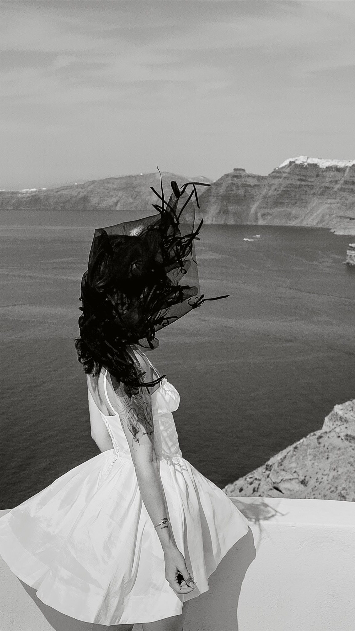 Unapologetically herself 🖤
Photography & Cinematography: @sollisstudio
Planning and Design: @augustinbloom
Venue: @elvientosantorini
Florals: @shadesofflowers.santorini
Tabletop & furniture: @maisontrilogie
Stationary: @juneandopal
Cake: @petranart_santornini
Accessories : @blairnadeaubridal
MU: @makeup.santorini.renia
Model: @dimitra.boti
——————
#LuxuryDestinationWedding #FineArtWeddingPhotography #EuropeanWeddingPhotographer #LuxuryWeddingPlanner #ExoticWeddingDestinations #DestinationWeddingPhotographer #TimelessWeddingMoments #EditorialWeddingPhotography #RomanticWeddings #TheArtOfWeddings #LuxuryBride #WeddingInspirationDaily #CuratedWeddings #OldWorldRomance #ModernLoveStories #CinematicWeddings #DestinationWeddingDream #WanderlustWedding #ElegantWeddingAesthetic #LuxuryWeddingExperience