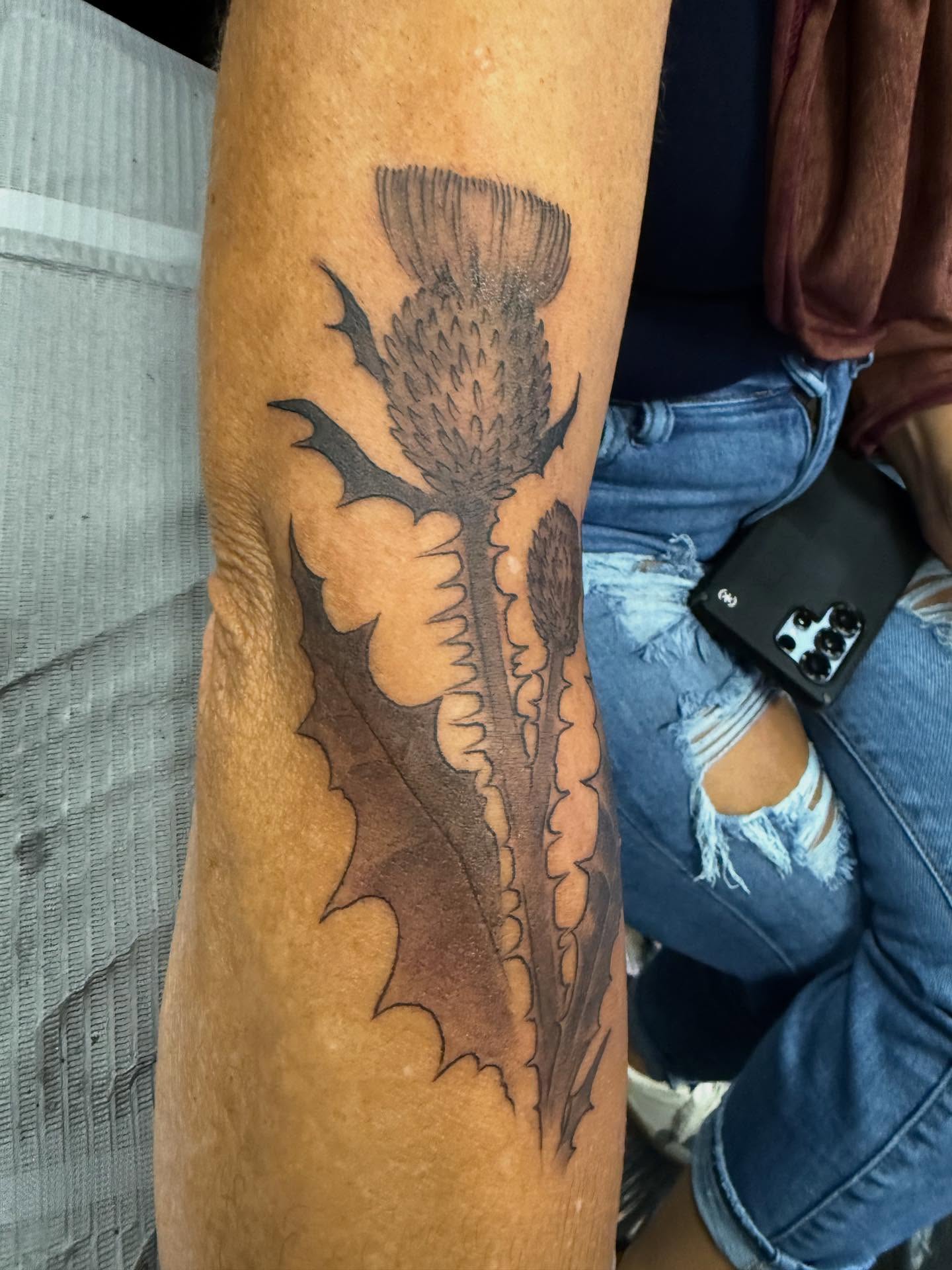 Thistle on a lovely lady from the Richmond Tattoo Arts Festival…