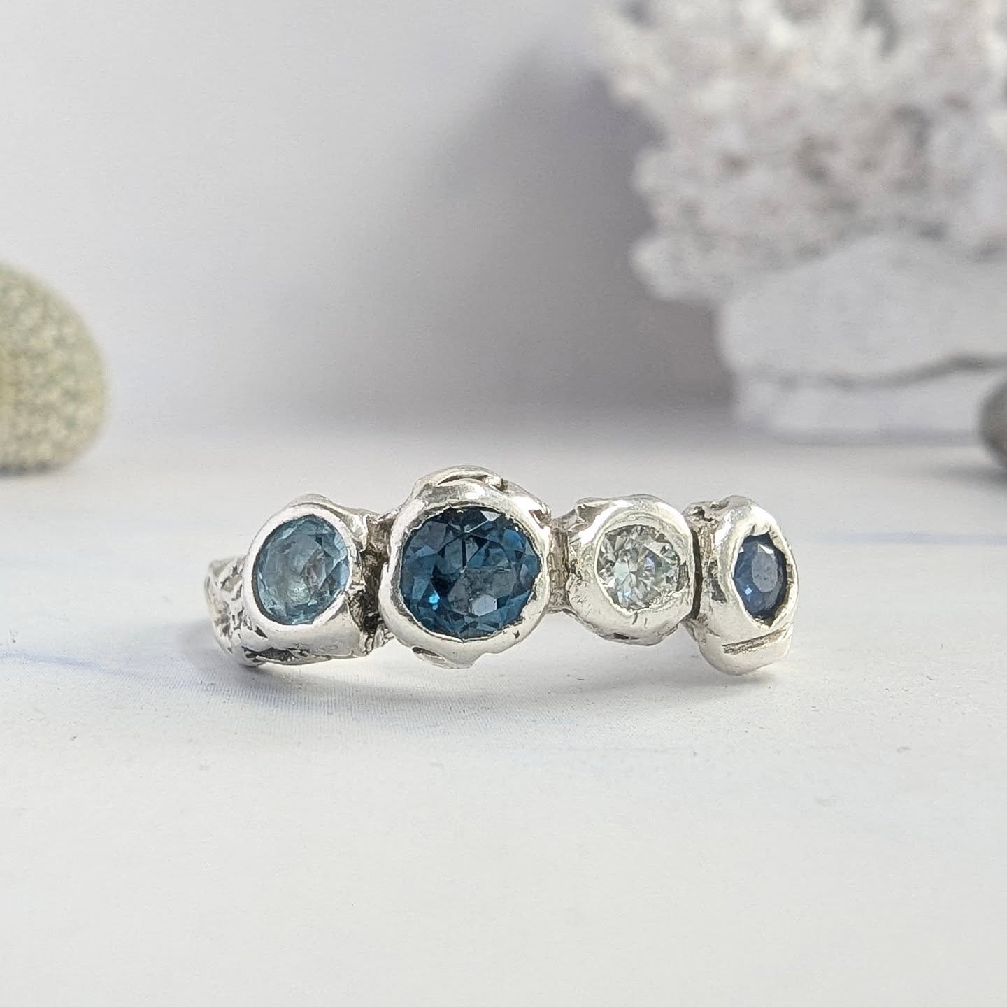 Introducing "Lagoon" ring one (out of three) of the new Rock Pool collection rings.
These rings capture the texture and colours of the tideline, especially in and surrounding Rock Pools.
Made in hand sculptured silver or gold they are set with a combination of four beautifully selected diamonds and sapphires, each ring is individually handmade and hand set which makes each one totally unique and open to a degree of personalisation, exactly how heirloom jewellery should be, in my opinion.
#sculpturedjewellery #handmadejewellery
#heirloomjewellery
#oceanjewelry #oceaninspiredjewelry #custommade #seaweeddance #sapphires #diamonds #artisanjewellery #madebyhand #slowmadejewellery #slowmade