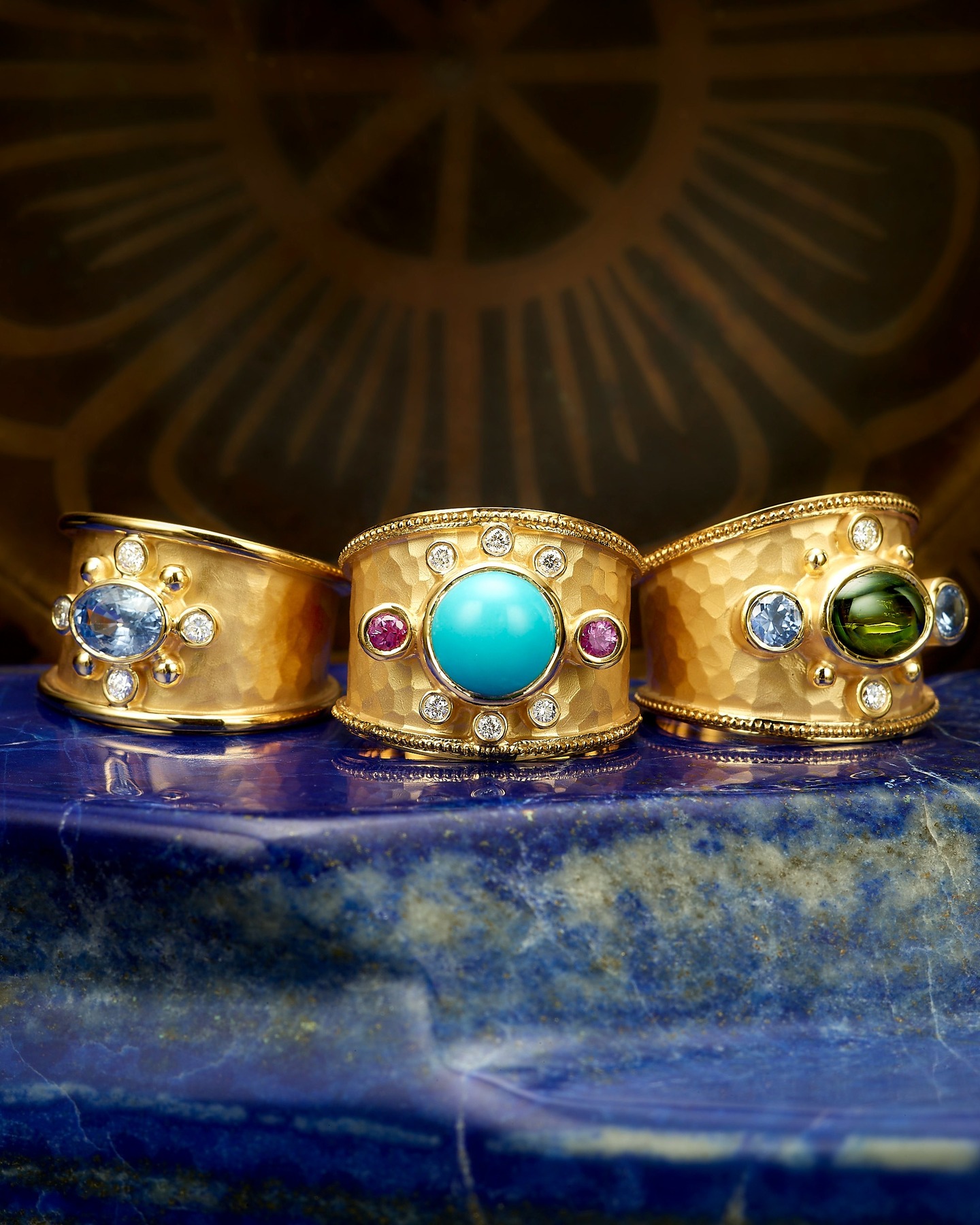 Radiant color, sculpted gold, and gemstones that feel alive.
Each ring is handcrafted in rich 14k gold with a hammered finish, framing a vibrant center stone— blue sapphire, electric turquoise, deep green tourmaline—surrounded by meticulously set diamonds and sapphires.
A celebration of bold elegance and artisanal detail.
Modern heirlooms, made to hold presence.
#ring #goldring #sapphires #tourmaline #turquoise #jewelry #goldjewelry #hammeredgold #diamonds #artisanjewelry #handcraftedjewellery #luxuryjewelry #couturejewelry #marikadesertgold #yellowgold