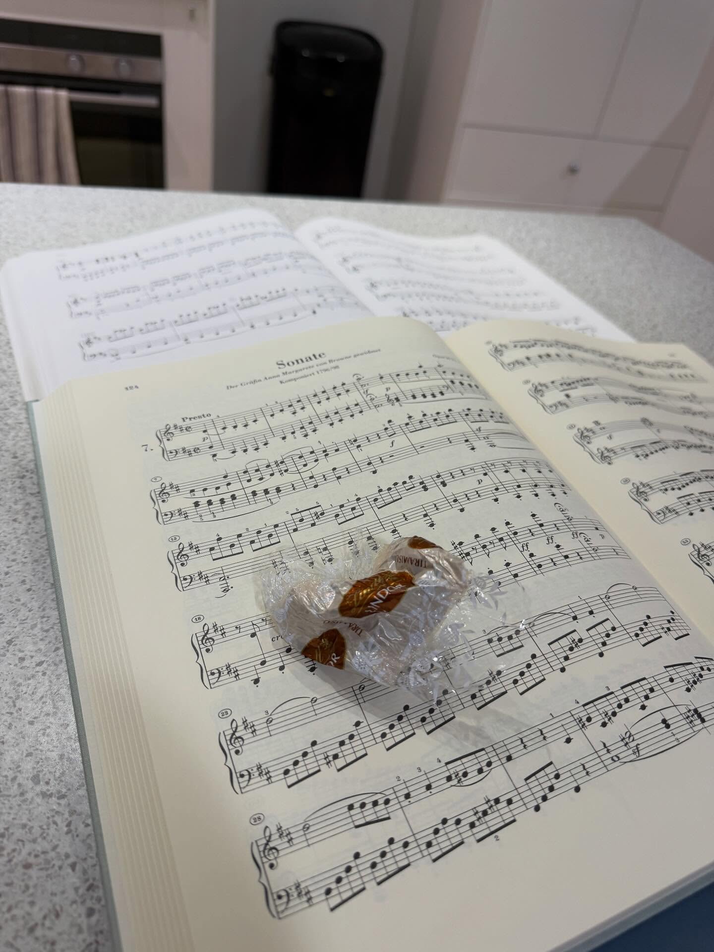 …late night Beethoven Sonata analysis after a 15 hour day. What a fortnight! To be fair, I’ve been privileged to listen to some amazing pianists across examining, senior music extension recitals, and online competitions. I deserve this tiramisu Lindt ball…I DO! Next stop, emails and convincing my friends that I’m still alive. #danieljohnson #danieljohnsonpianist #music #piano #pianist #studiolife #beethoven @lindt_au #examining #musician #classicalmusic #benice #potd #igers #thursday