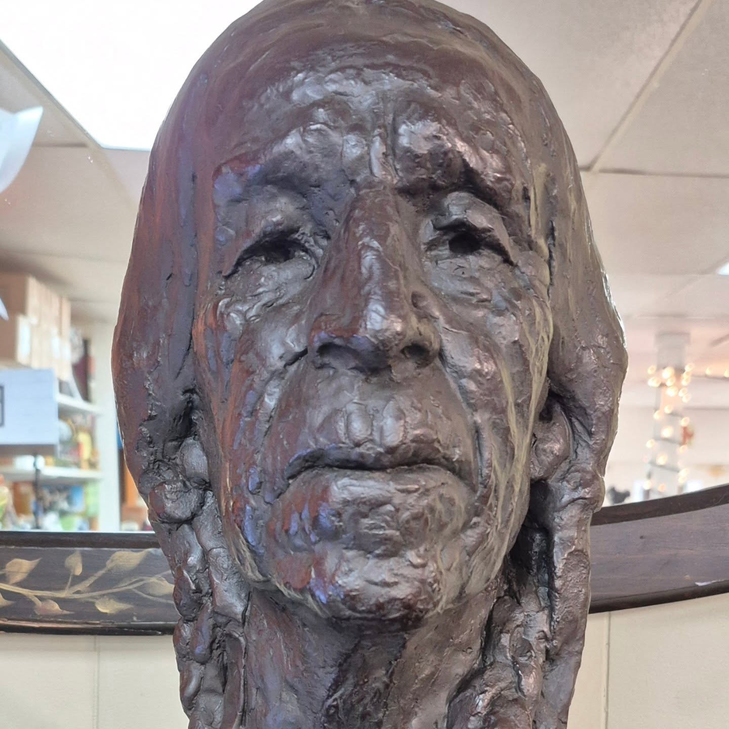 Awesomely unique piece JUST IN! Coolness just not effective thru pictures. Come see! Bronze bust of Native American man! Signed piece 1978 Alva Studios.