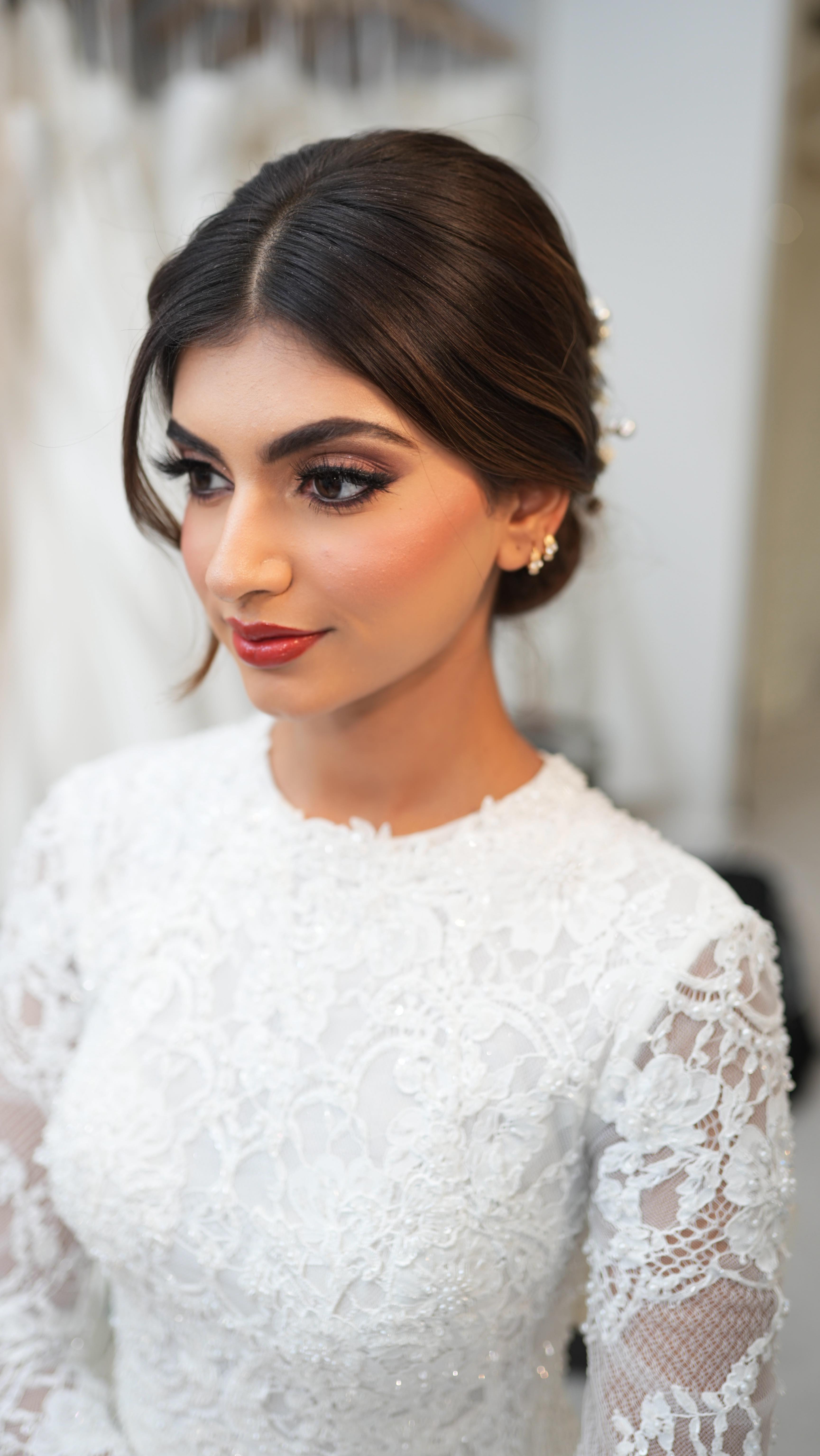 The difference between a beautiful bridal look and an unforgettable one lies in precision.
When working with warmer skin tones against the purity of white lace, the harmony lies in how you balance light, depth, and tone.
For women of colour, those subtle adjustments make all the difference:
✨ Choosing the right undertone so your glow doesn’t turn grey under flash.
✨ Adding warmth through blush and lip tone so your complexion doesn’t get washed out against ivory or white.
✨ Softly defining the eyes to balance depth without overpowering the elegance of the dress.
This look was designed to celebrate melanin and minimalism - refined, radiant, timeless.
Whether it’s for your civil ceremony, church wedding, or reception soirée, remember: the art lies in the finish.
🎵 Soundtrack: “Can’t Help Falling in Love” — Elvis Presley
The perfect soundtrack to timeless beauty and understated luxury.
👰🏽♀️
MUA & Hair: @ap_asianbridemakeup
Bride: @tiakariaa
Beautiful lace gown: @wweddinglondon
Photography & Videography: @photovideobyattractions
Jewelled hair accessory: @vintagekace
Save this post for your bridal moodboard - the finishing details matter more than you think ❤️
.
.
.
.
(Asian bridal makeup UK, women of colour bridal look, civil wedding makeup, white wedding makeup tips, soft glam for brown skin, elegant bridal makeup, melanin bridal makeup artist, Slough makeup artist, London bridal MUA, Berkshire bridal makeup, timeless bridal look, warm undertone makeup, bridal finishing touches, reception makeup for brides, classy church wedding glam, Elvis Falling in Love wedding reel, romantic bridal reel, Fairmont Windsor wedding, North Mymms Park wedding, Hedsor House bride, luxury UK wedding venues, editorial bridal makeup London, soft glam civil wedding, melanin bride UK)