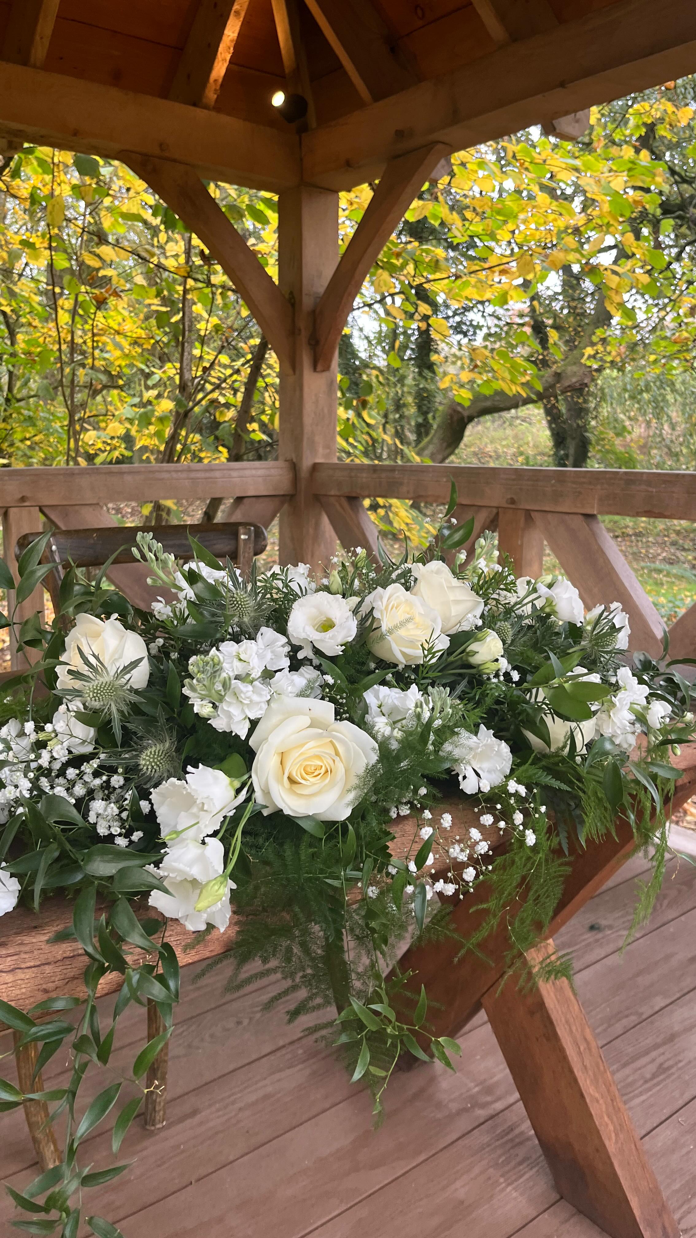 🌿WHITE WEDDING🌿
We draped The Hideaway in rich forest green, with a trio of cylinder vases lining the aisle — simple, elegant, and timeless. 🌿🤍
The ceremony table featured a beautiful arrangement of white florals and greenery (including romantic roses!) which later found its perfect spot on the sweetheart top table for the wedding breakfast. The cascading waterfall drape completed the look — it always adds such a touch of elegance and movement.
For the guest tables, we styled forest green ruffled runners with log slices topped with trios of cylinder vases, surrounded by matching florals to tie the whole look together.
A day filled with timeless greens, soft whites, and so much love. 💚
Venue @thewoodlands.hothorpe
Florals @therusticweddingcompany
Styling @therusticweddingcompany
#WeddingStyling #HothorpeWeddings #WhiteWedding #WeddingDecor #SweetheartTable #AisleDecor #GreenAndWhiteWedding #WeddingInspo #UKWeddings #WeddingFlorals