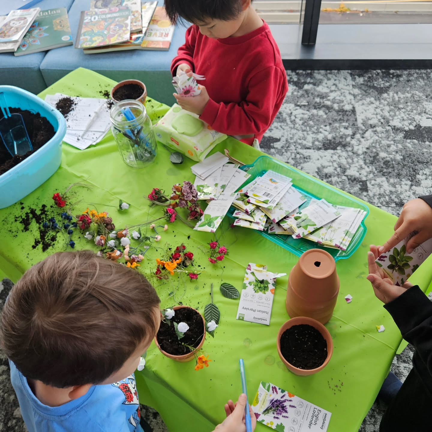 Yesterday we celebrated a very special bring-your-child to work day by painting and planting flowers!
The kids loved making their own custom designs, putting dirt into their pots and picking their favorite seeds. I got gifted some beautiful drawings and they even tried to keep me around by blockading my cart with jenga blocks! There was lots of fun and creative energy all around.
#creativeworkplace #crafttime #healingburnout