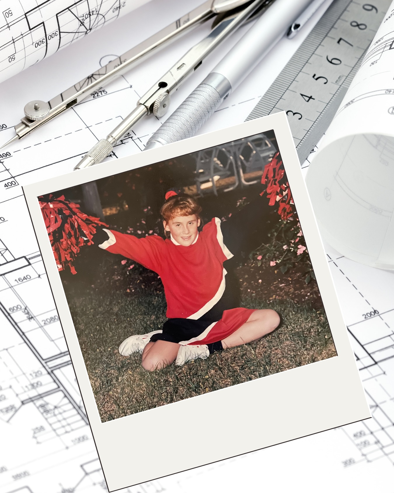 Discussing my why this week: Part 2… but before I go on, yes that cheerleader is me as a kid 😬 go panthers ❤️🖤 lol!
Design has always been in me.
As a kid, I sat on the floor of my mom’s office flipping through Country Living magazines — but I didn’t care about the pretty pictures.
I was obsessed with the house plans.
I’d study how rooms connected… and imagine myself living in those spaces. Picking pieces from one and blending them with another. I didn’t realize that not everyone thinks in floor plans.
So to sum up: I’ve always been drawn to the idea of home — not just how it looks, but how it feels. ✨