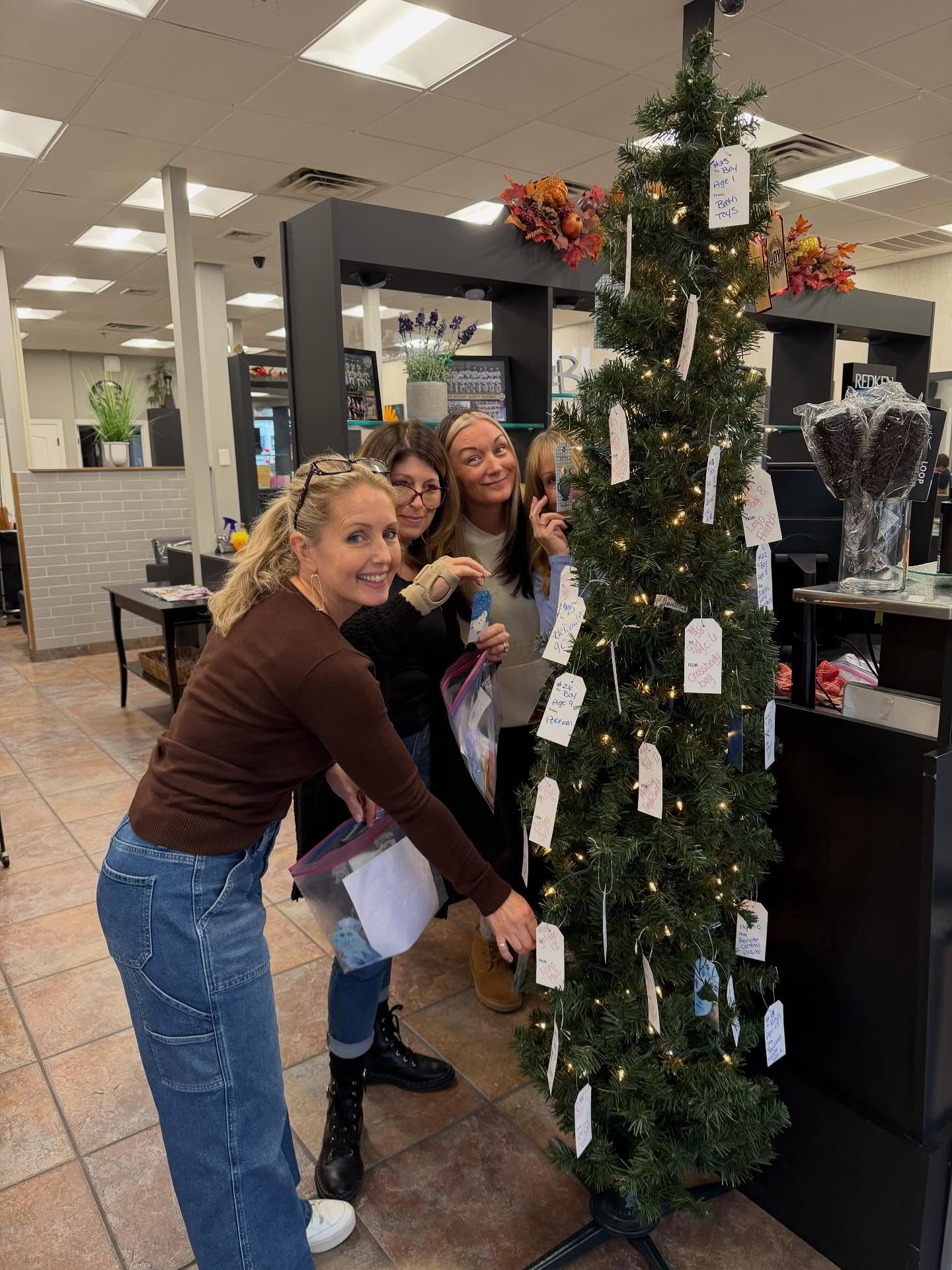 The tree is all set! Come in and take a tag with a child’s name